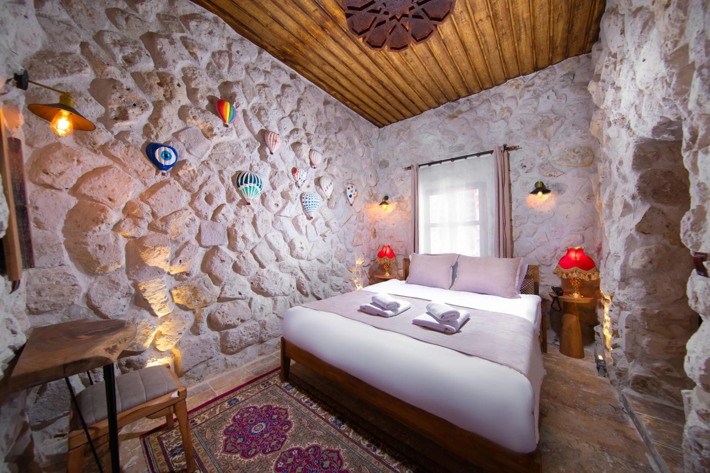 Bed in Cappadocia Cavusin Stone House