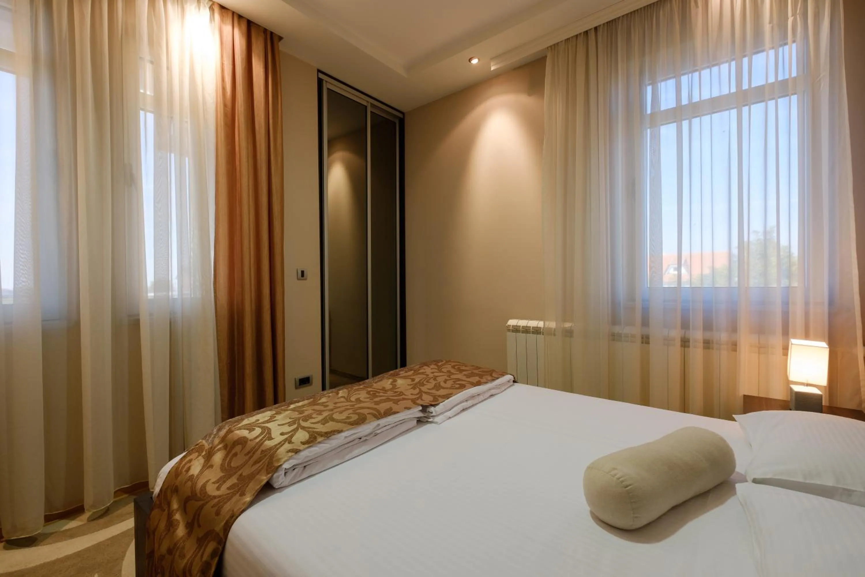 Bed in Apart K Apartments