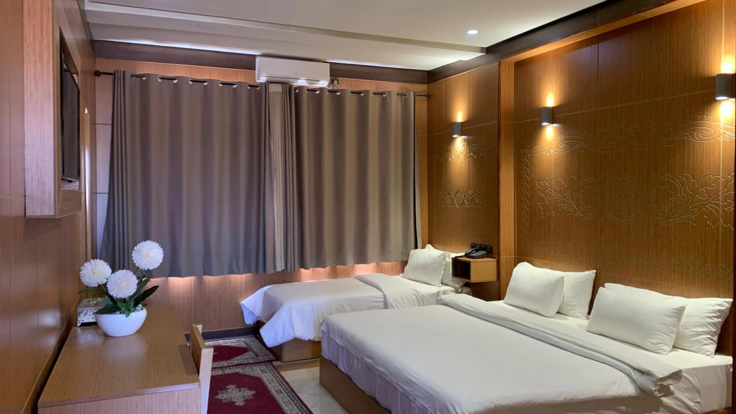 Bed in Hotel Oasis Palace