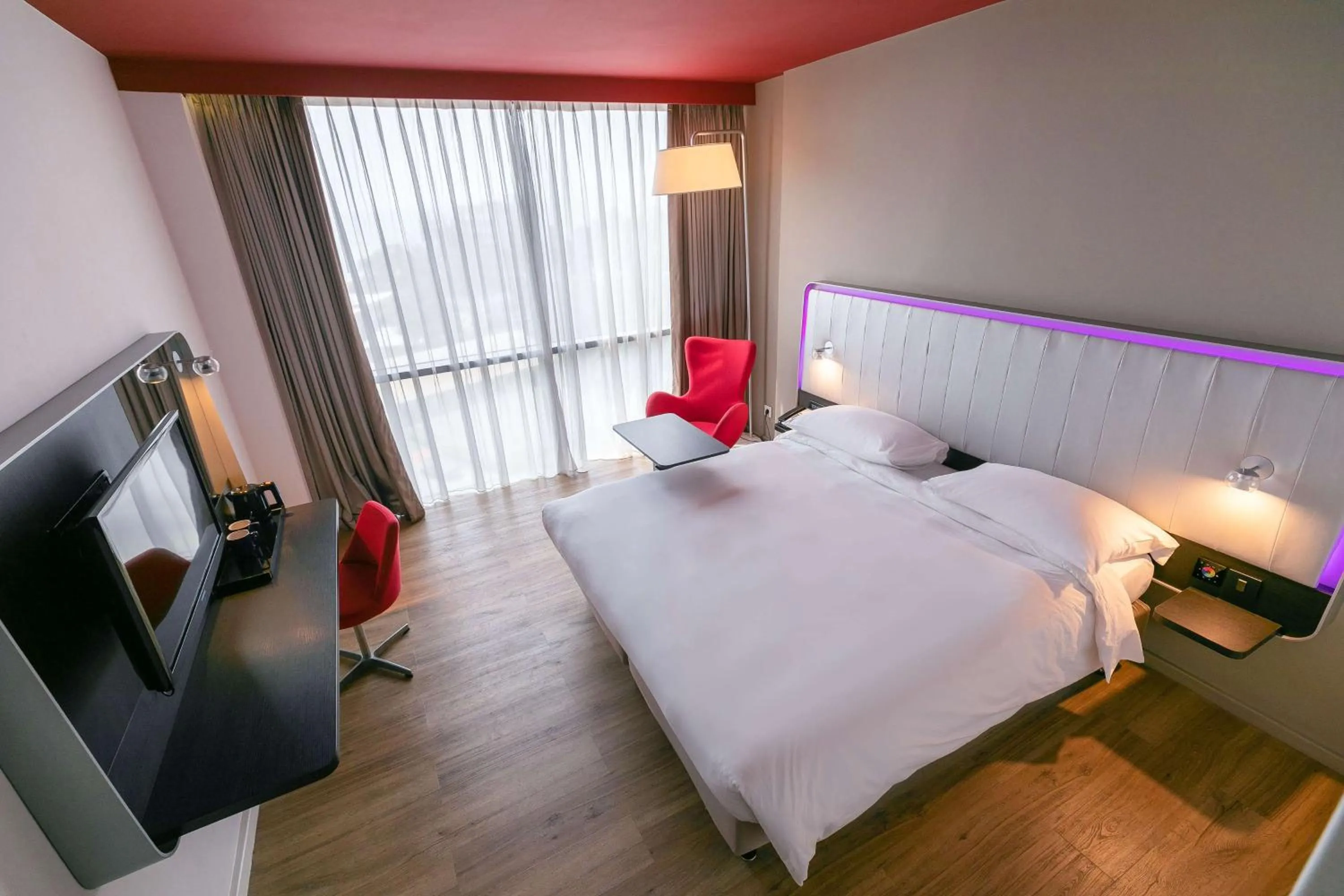 Photo of the whole room, Bed in Park Inn by Radisson Libreville
