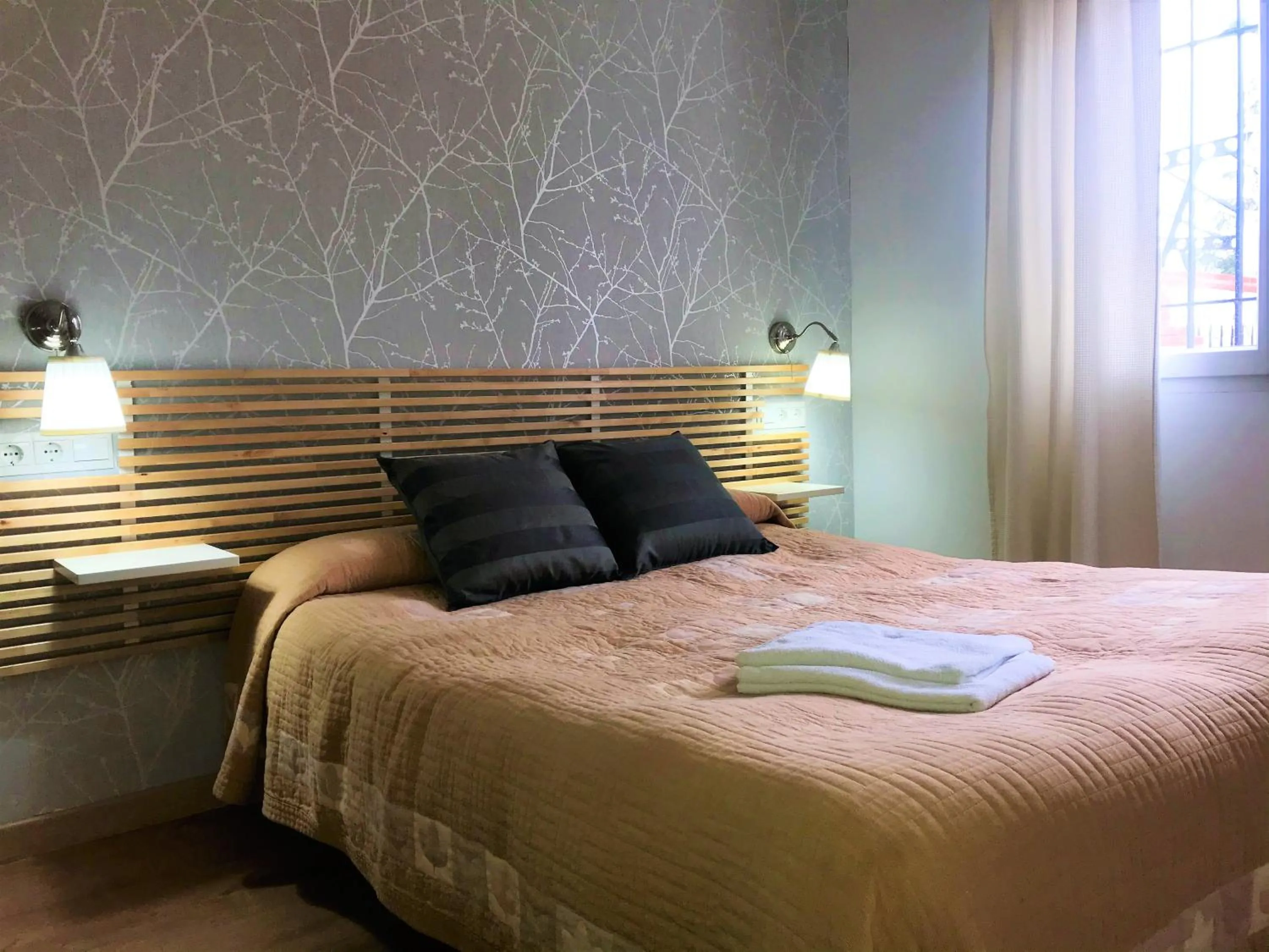 Bedroom, Bed in Apartamentos Ronda Luz