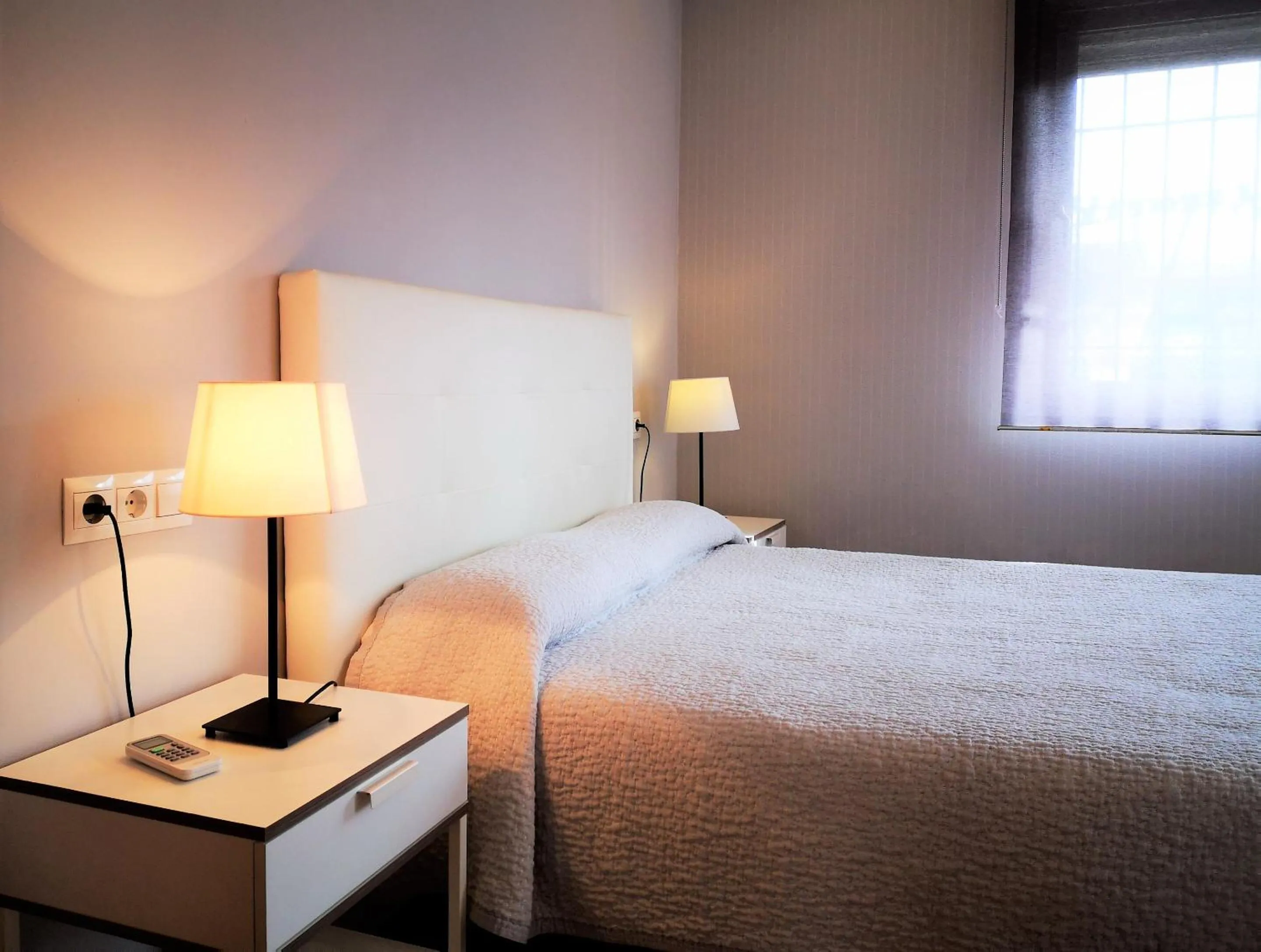 Bedroom, Bed in Apartamentos Ronda Luz