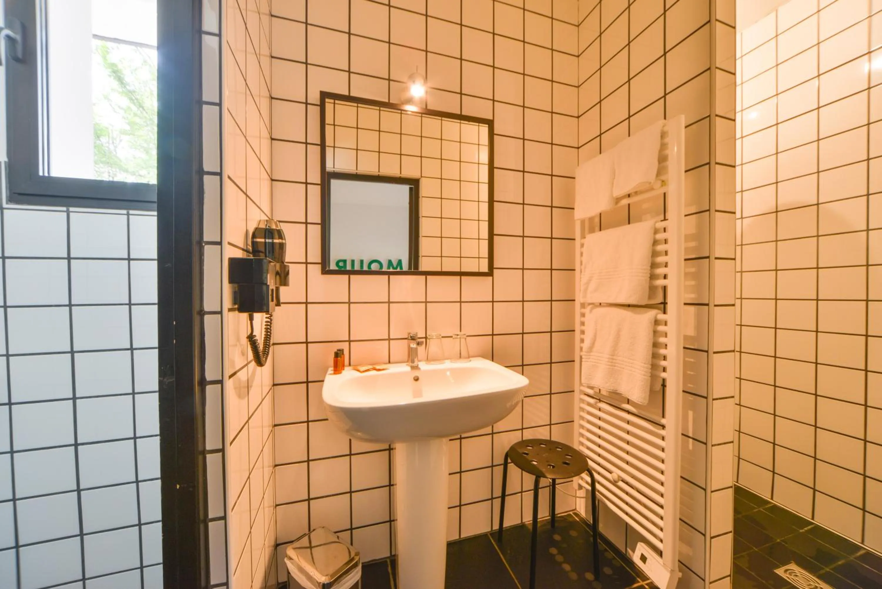 Shower in Logis - Hotel Restaurant La Mire
