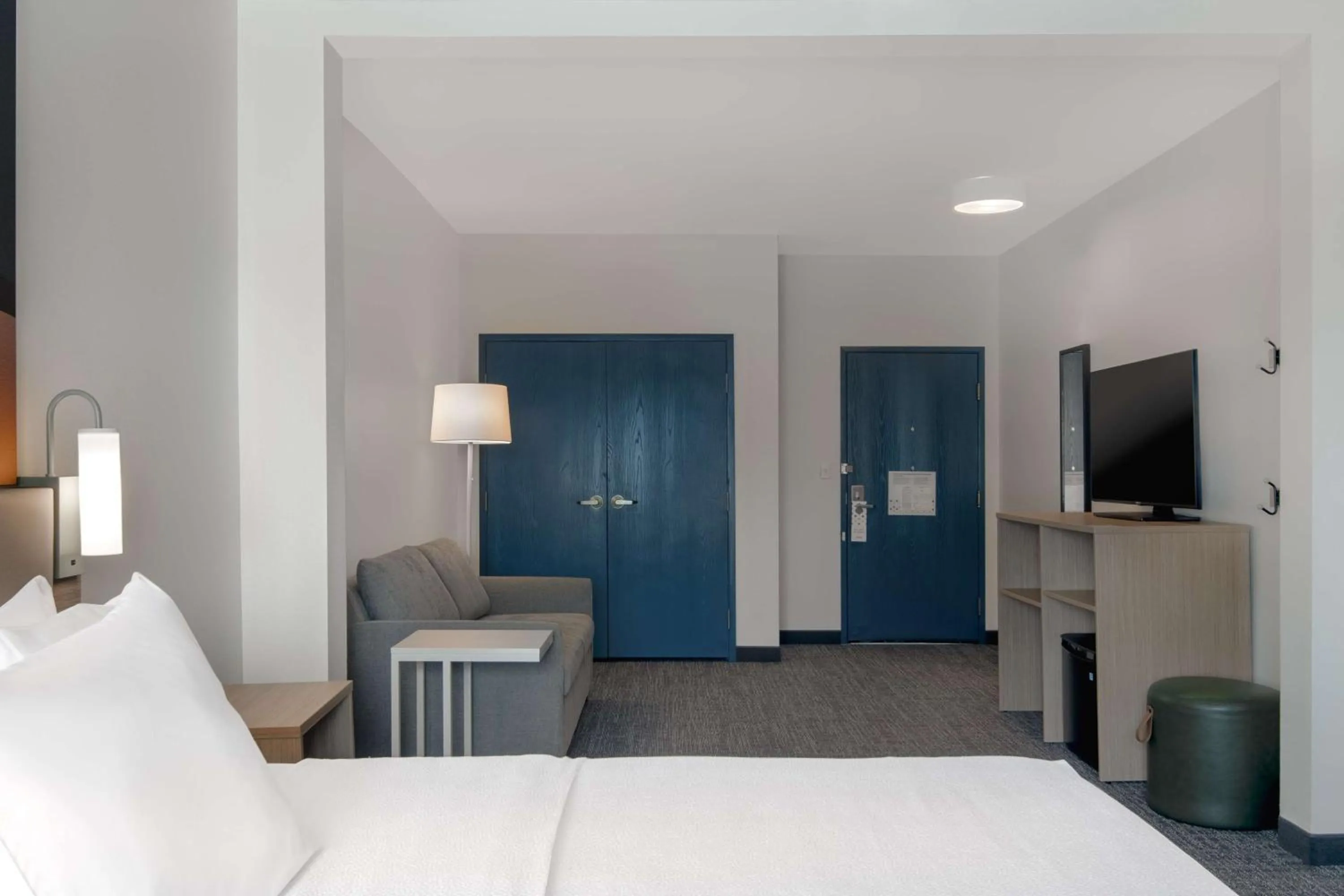 Living room, Bed in Spark by Hilton Montgomery EastChase