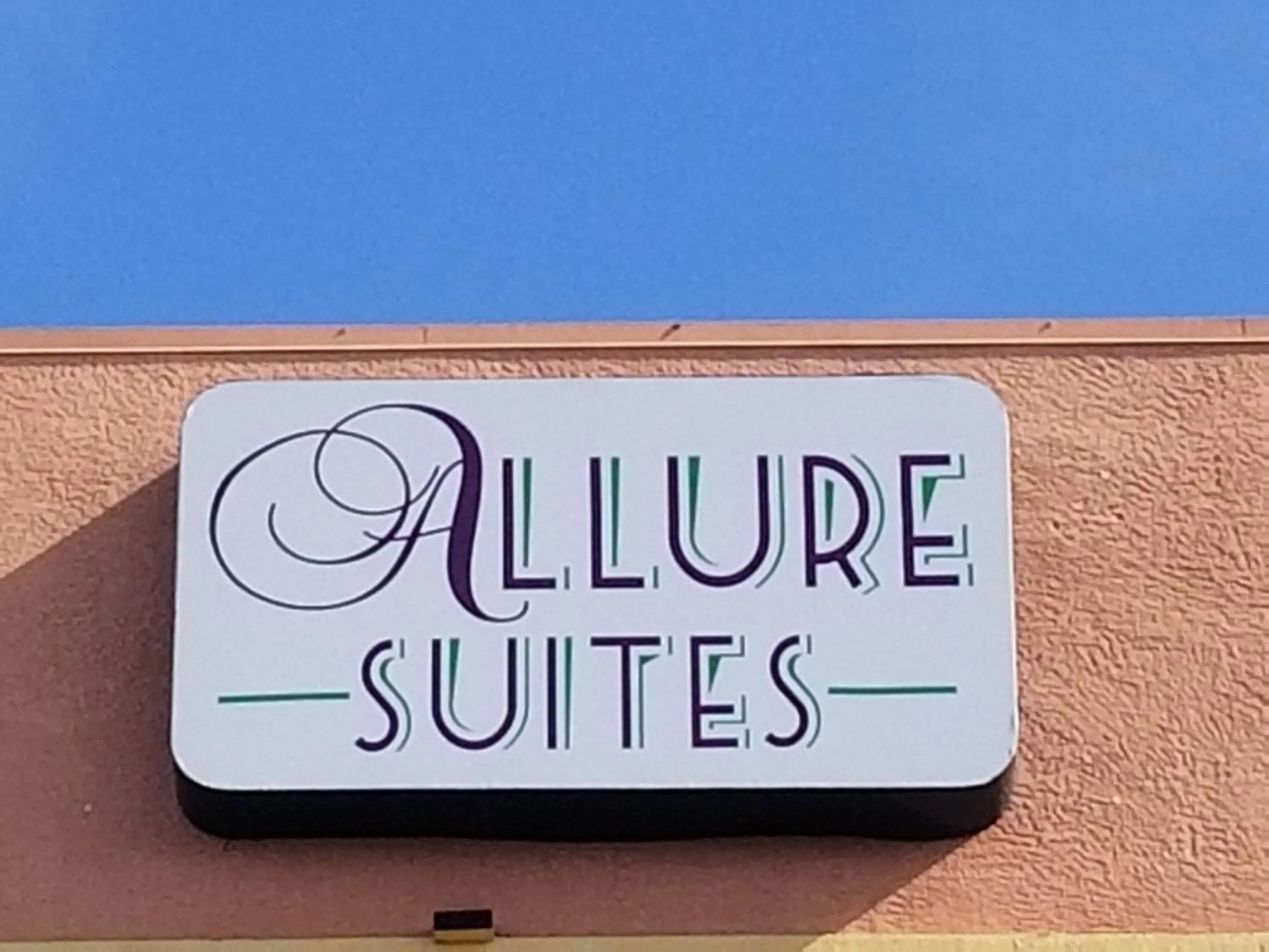Property logo or sign in Allure Suites of Fort Myers