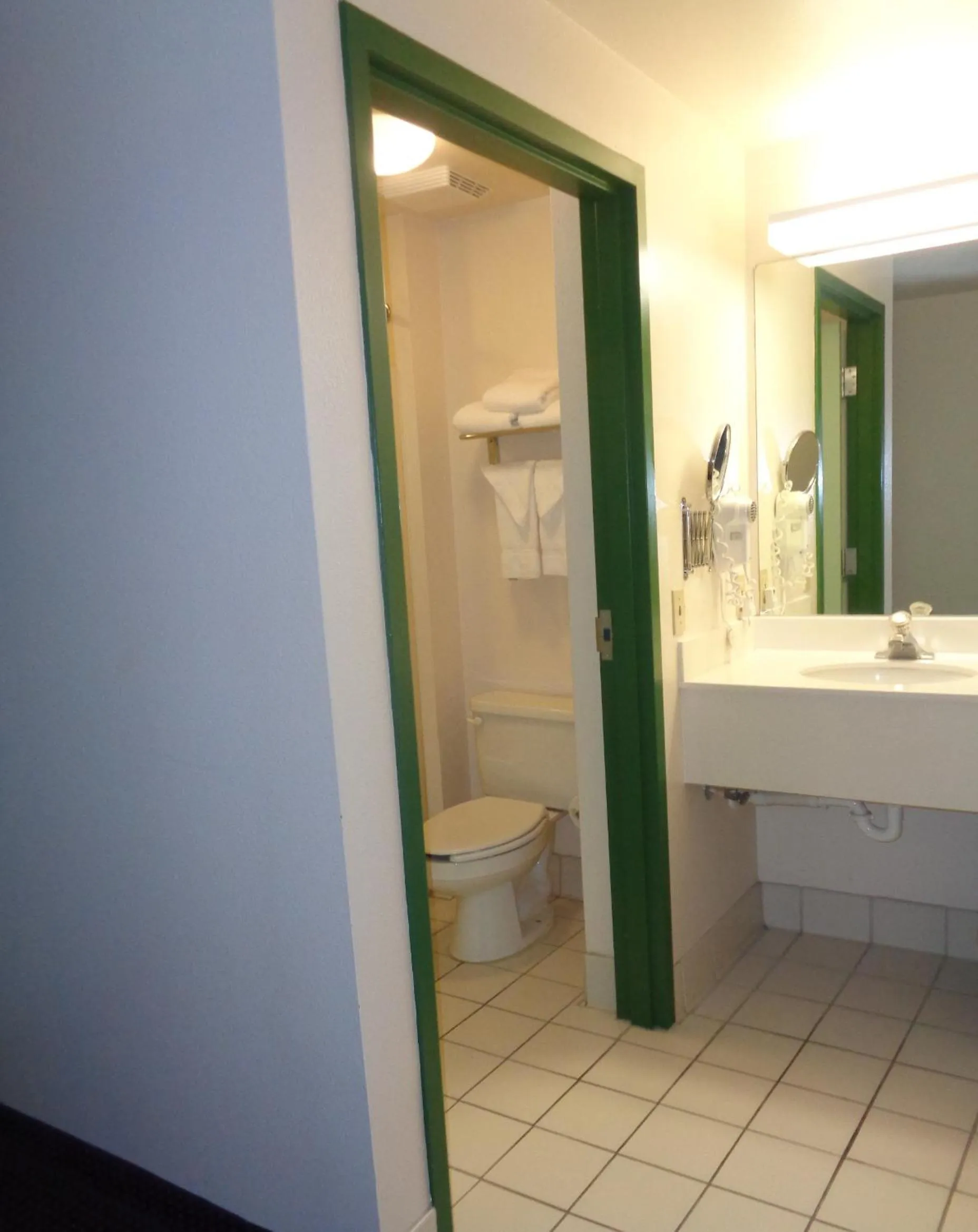 Toilet in Allure Suites of Fort Myers