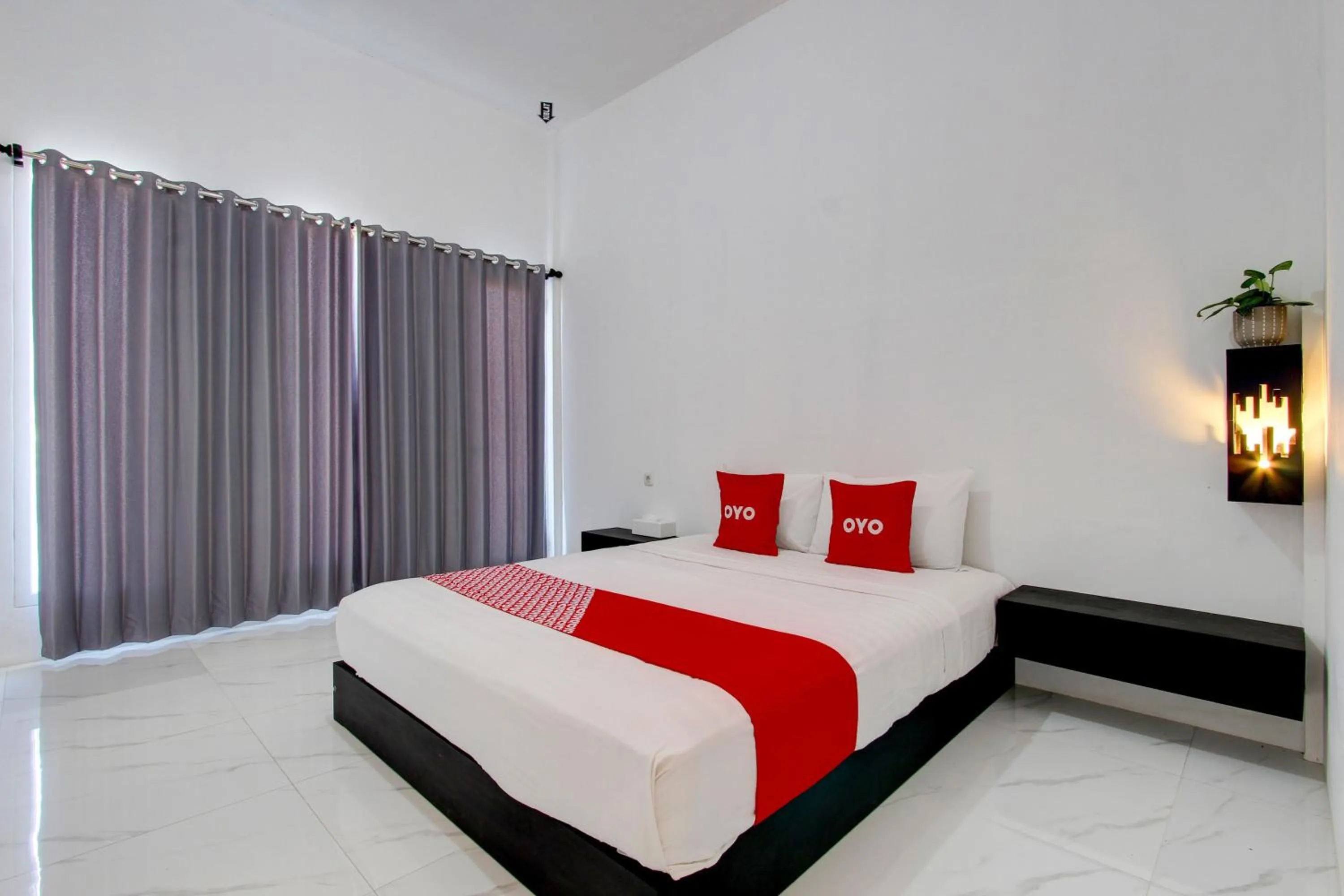 Bedroom in Hotel O D'harjo Guesthouse