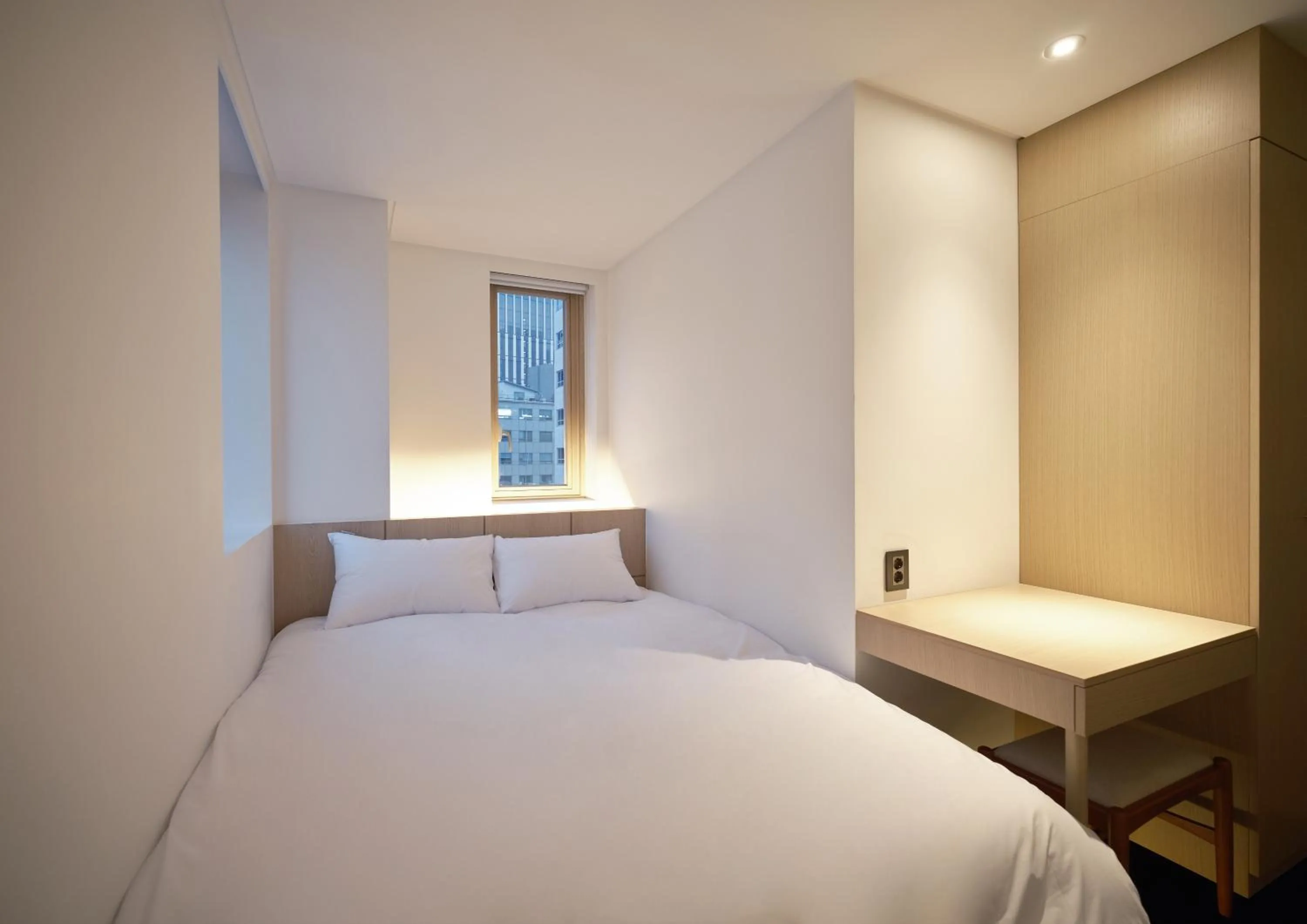 Bed in UH Suite Seoul Deoksugung