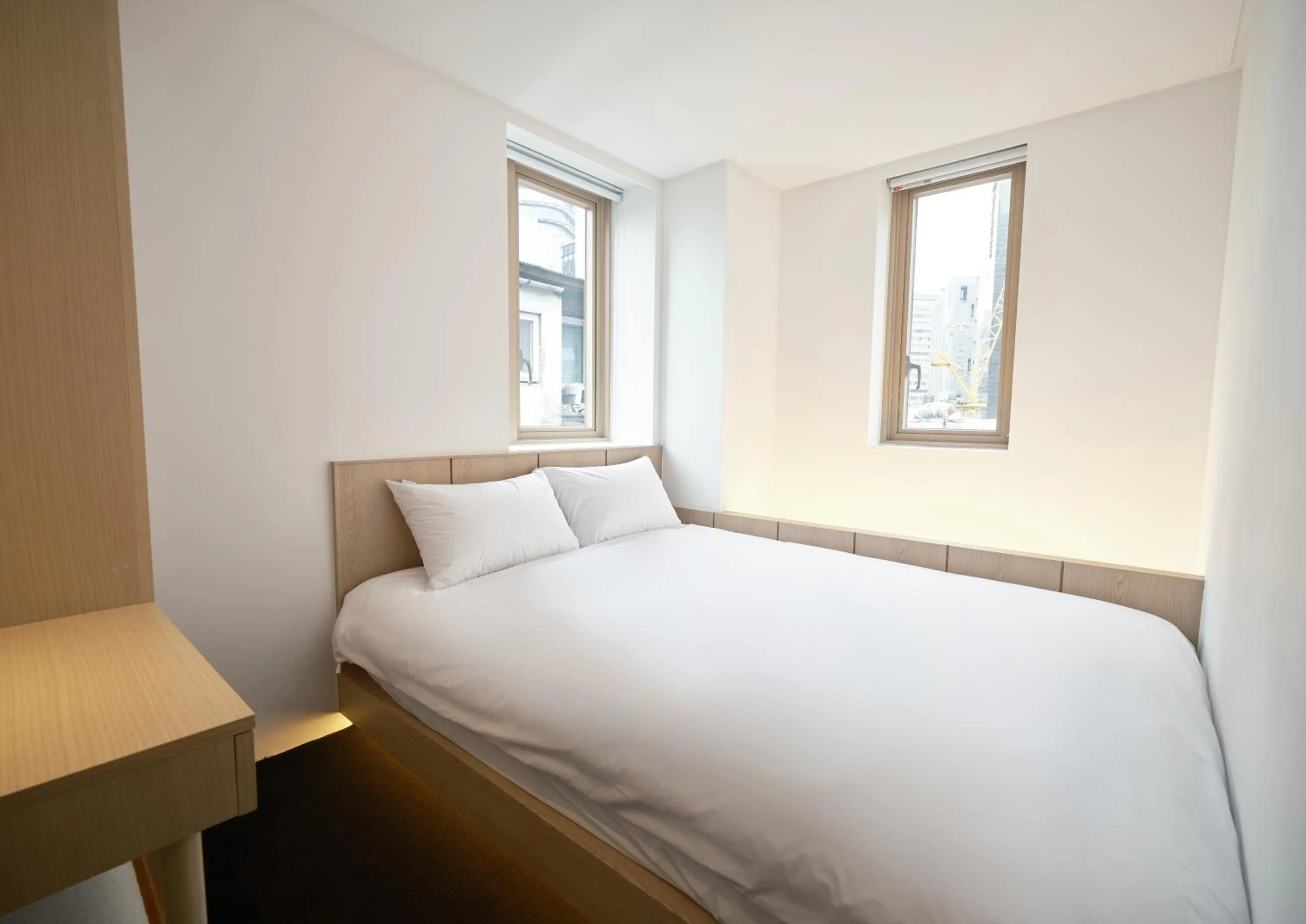 Bed in UH Suite Seoul Deoksugung