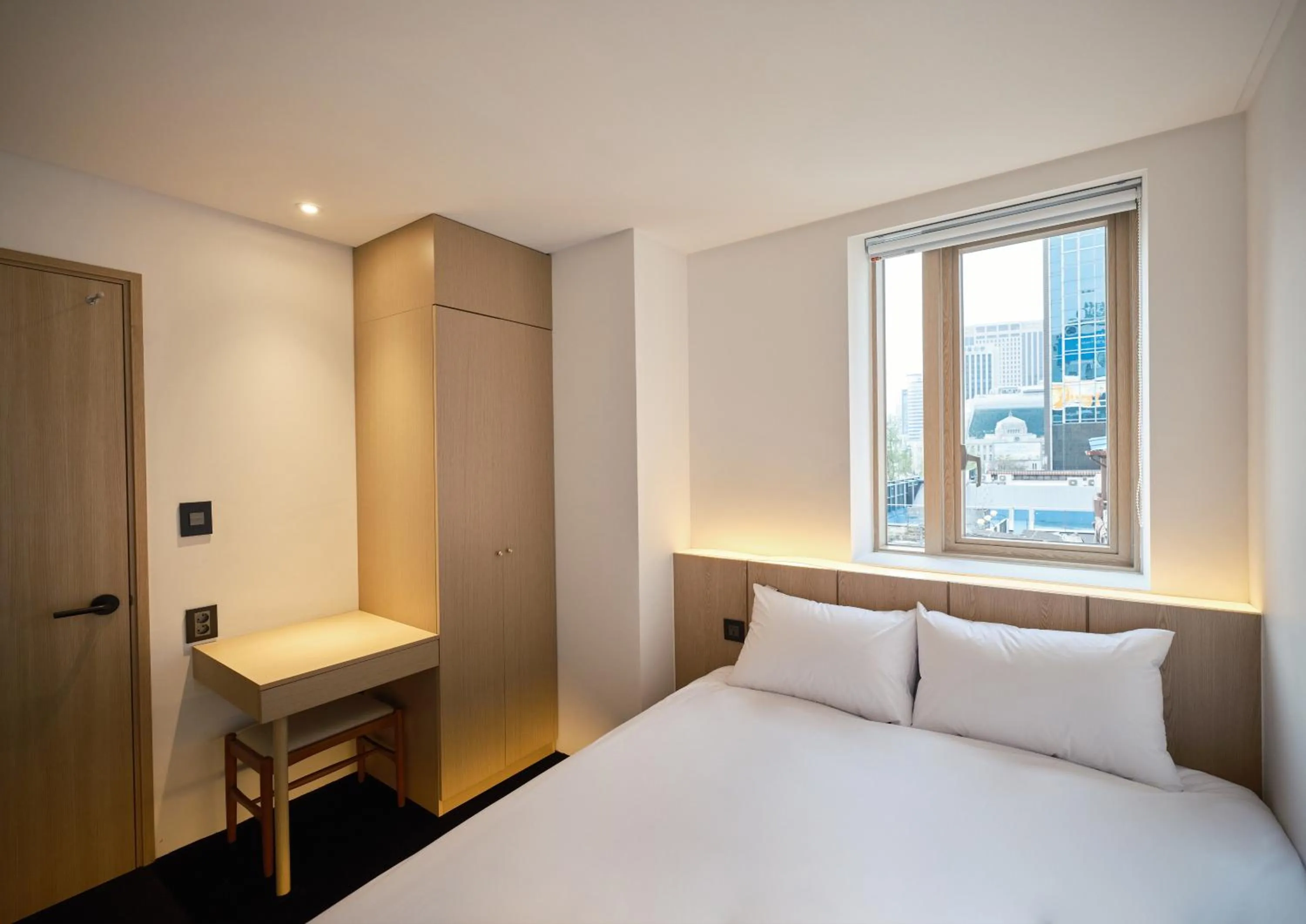 Bed in UH Suite Seoul Deoksugung