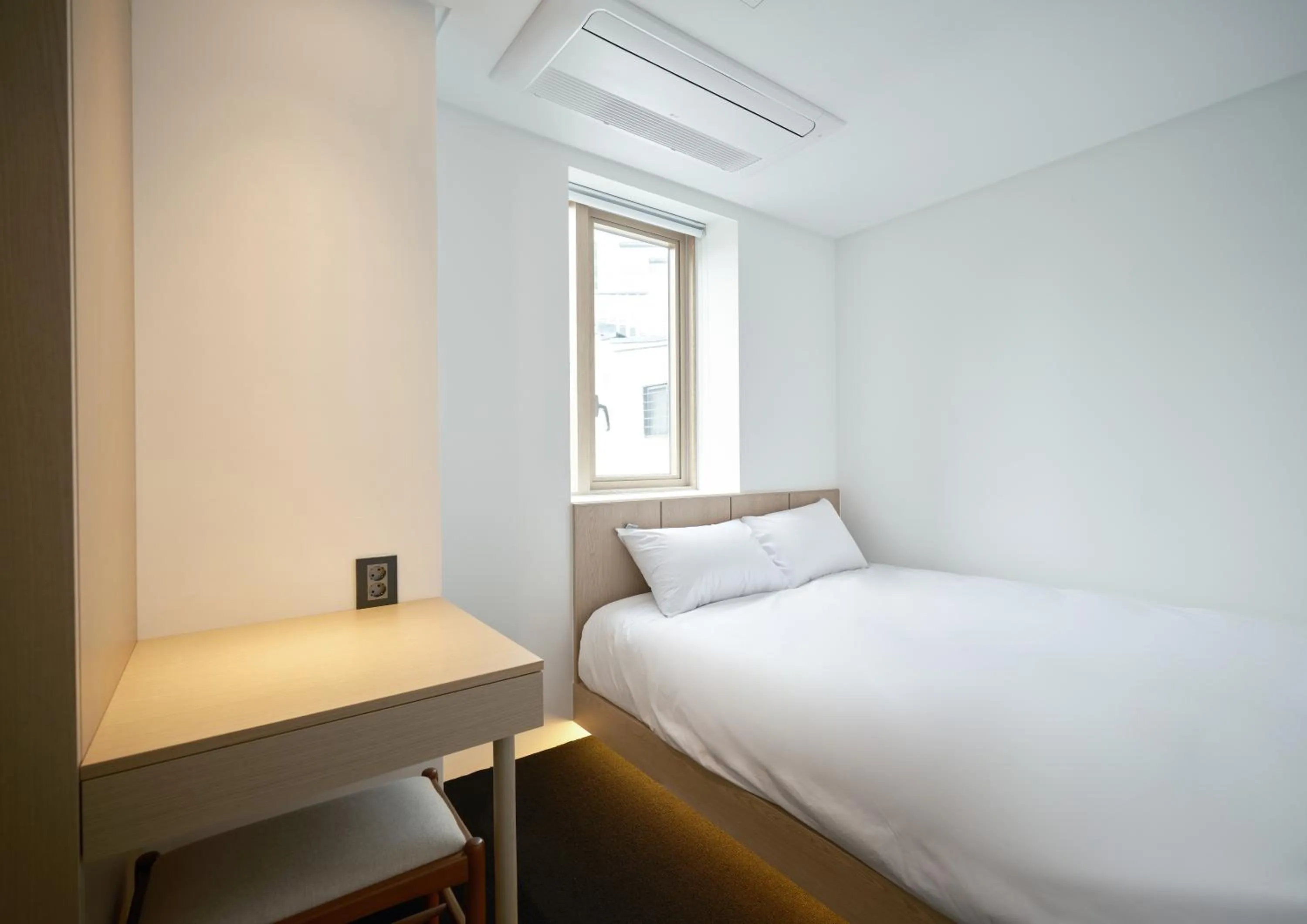 Bed in UH Suite Seoul Deoksugung