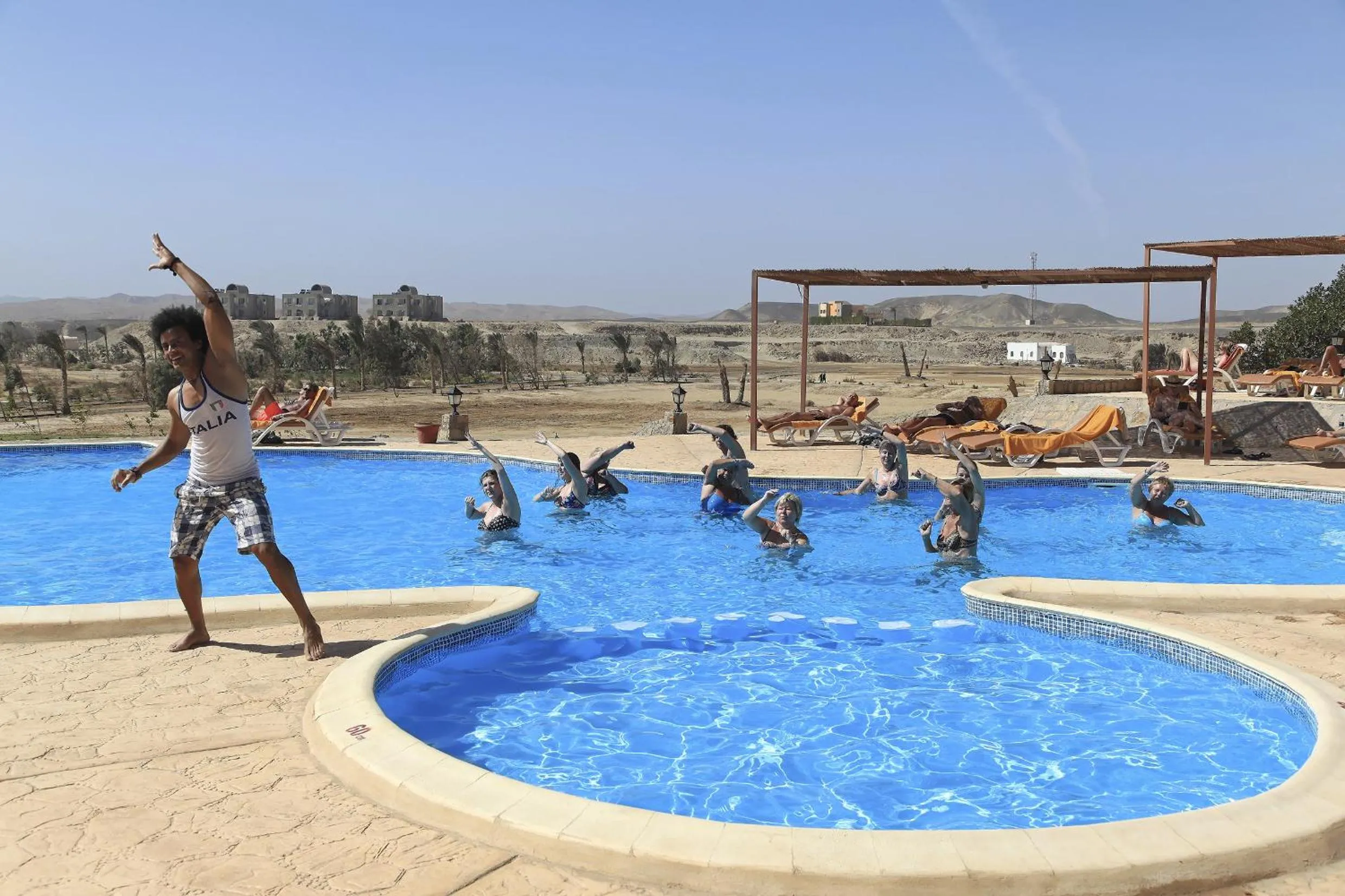 People in Three Corners Equinox Beach Resort