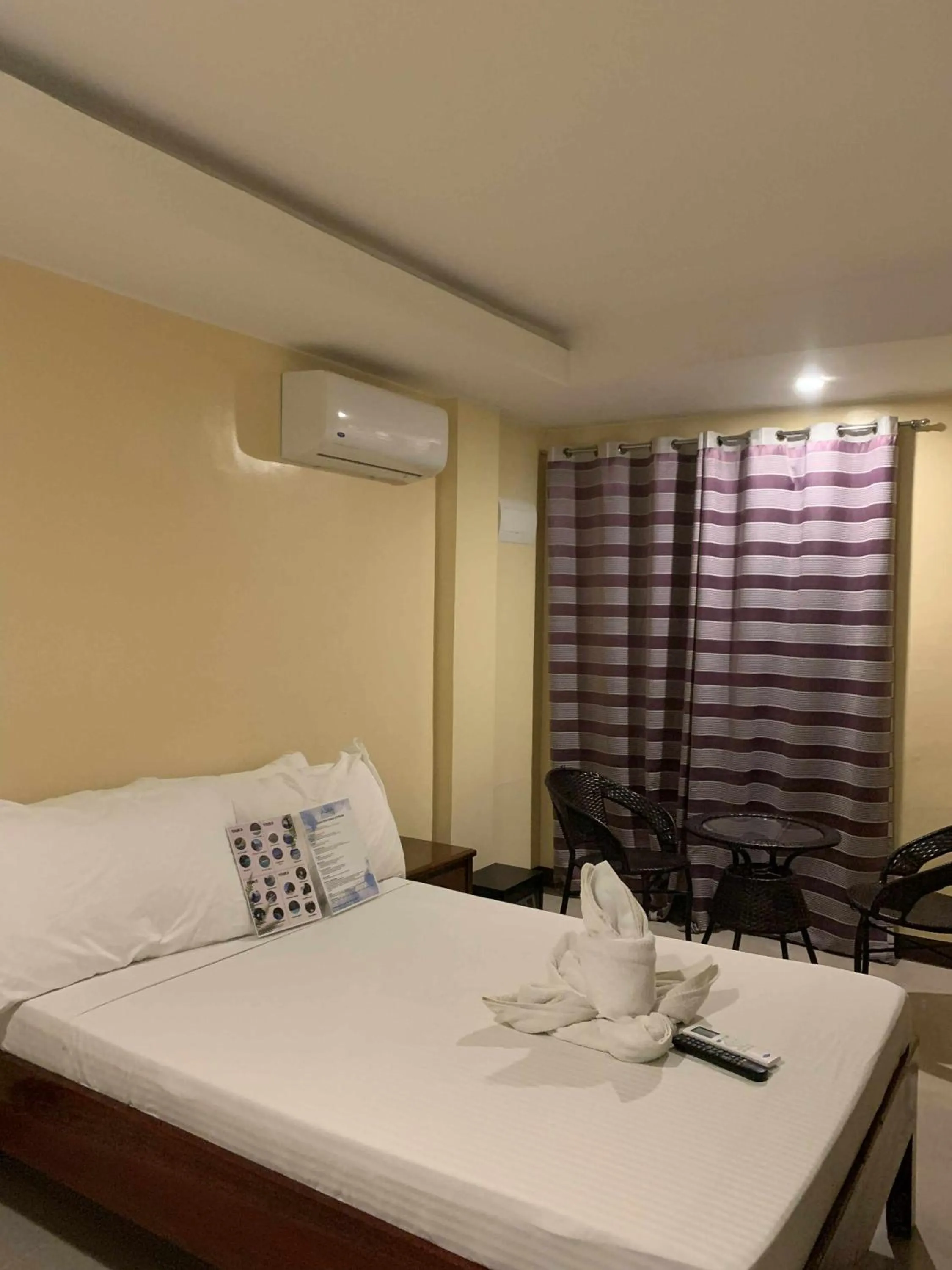 Bed in Aqua Travel Lodge