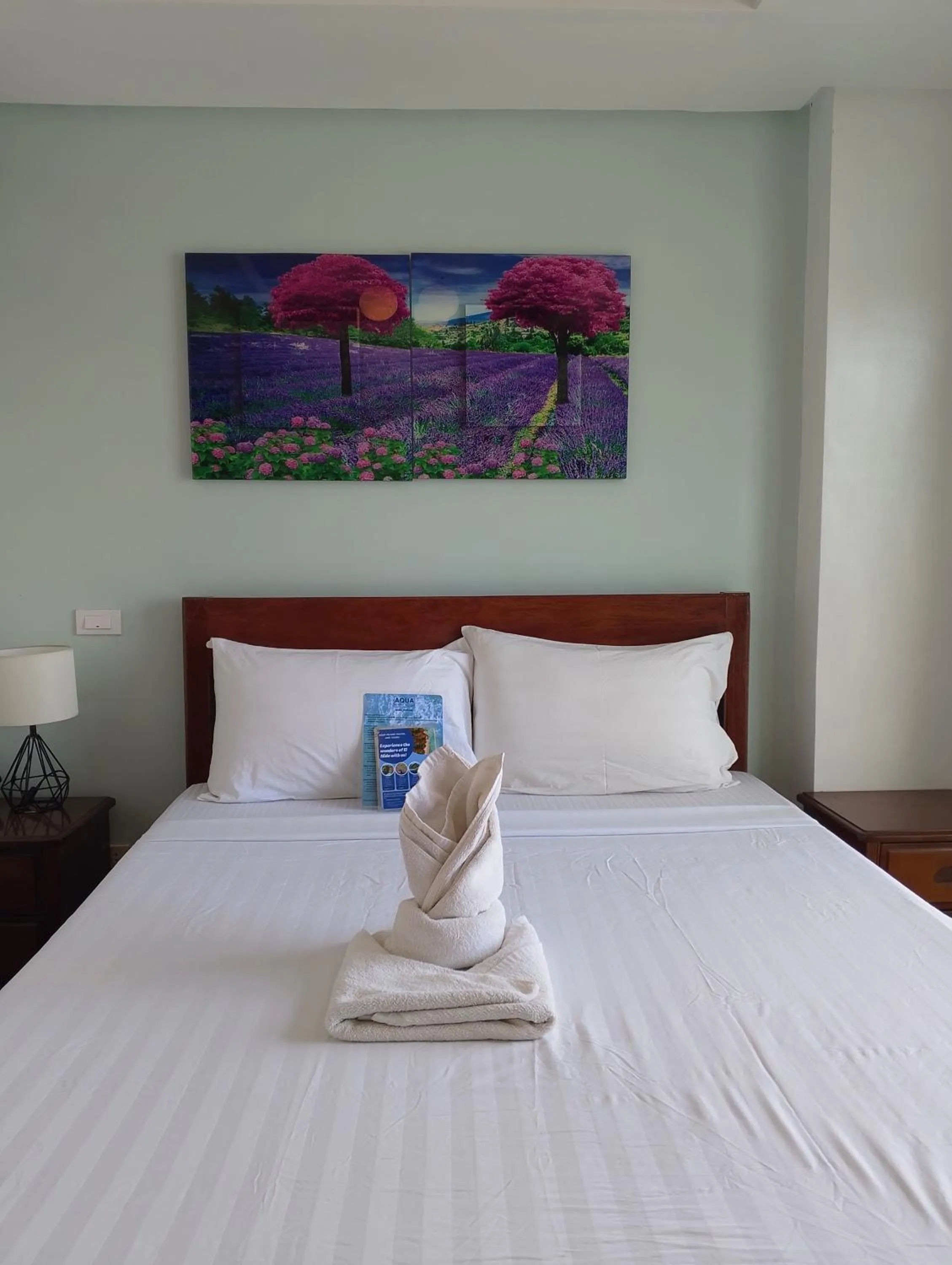 Bed in Aqua Travel Lodge