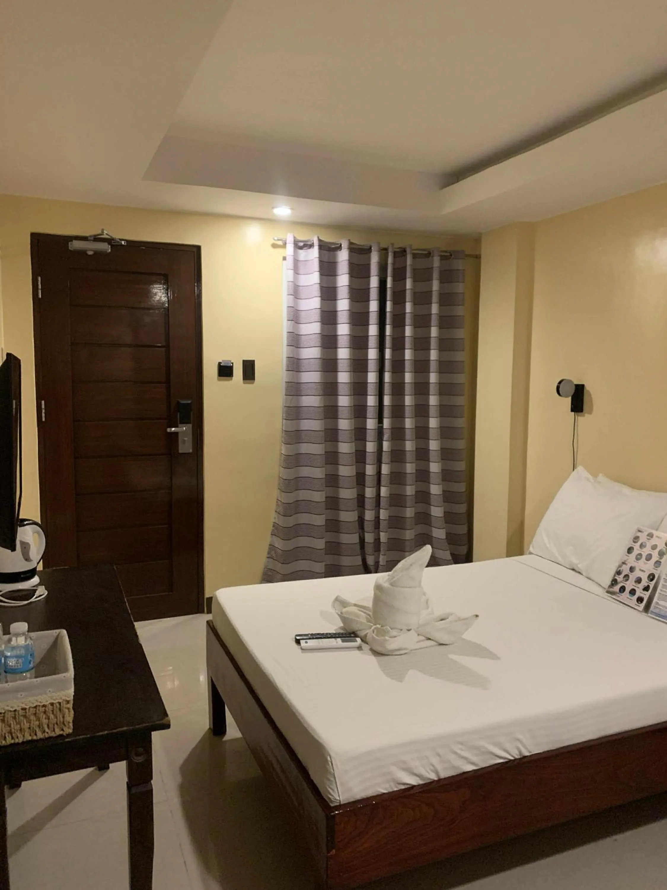 Bed in Aqua Travel Lodge