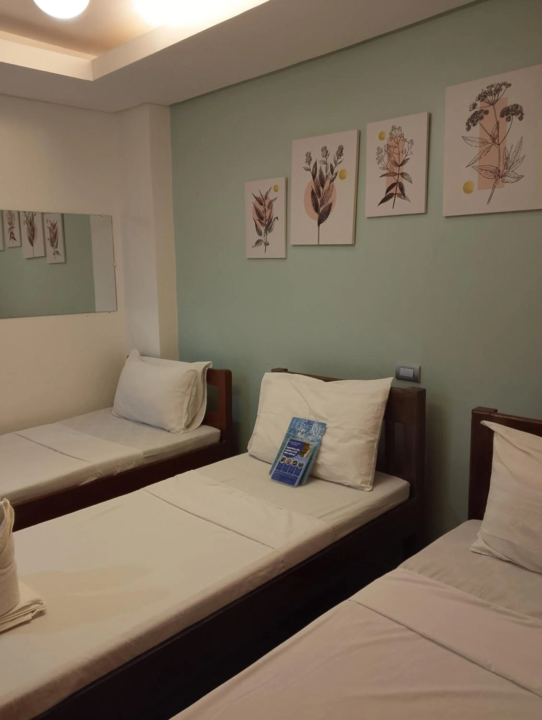 Bed in Aqua Travel Lodge