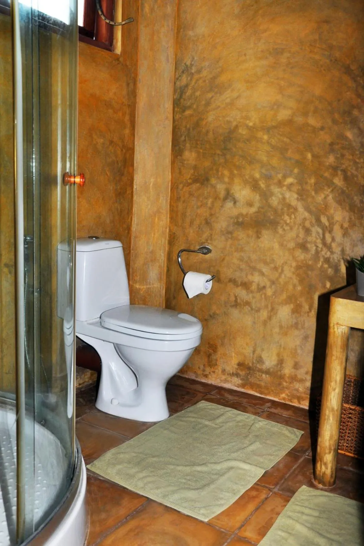 Toilet in Solomon Beach Hotel