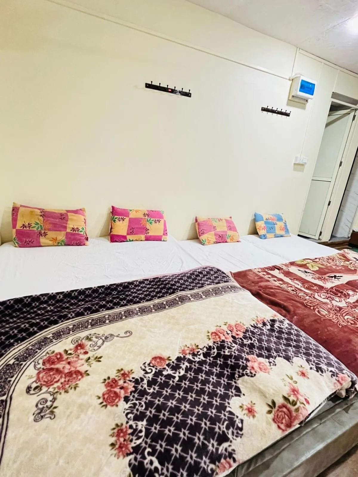 Photo of the whole room, Bed in Shri Shiv Ganga Bhakt Niwas