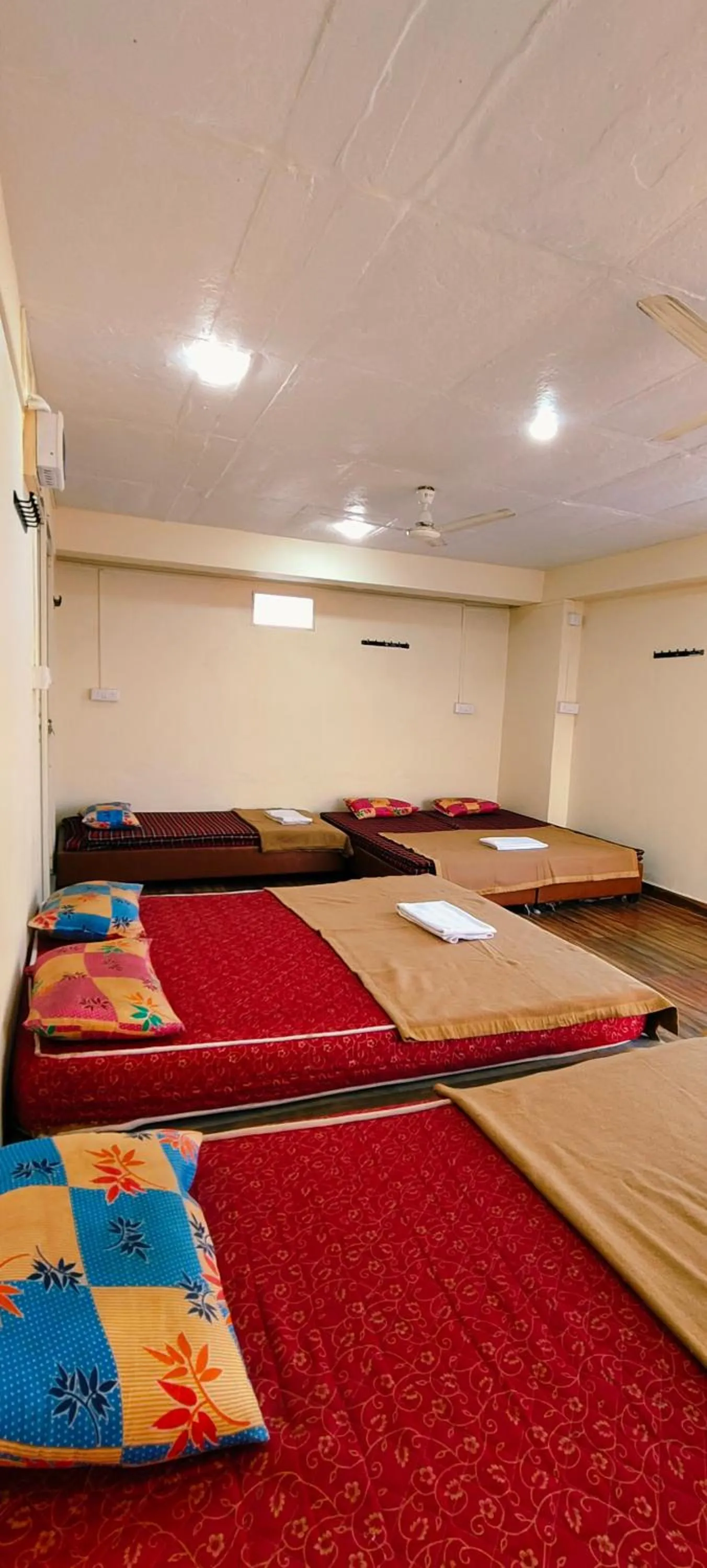 Photo of the whole room, Bed in Shri Shiv Ganga Bhakt Niwas