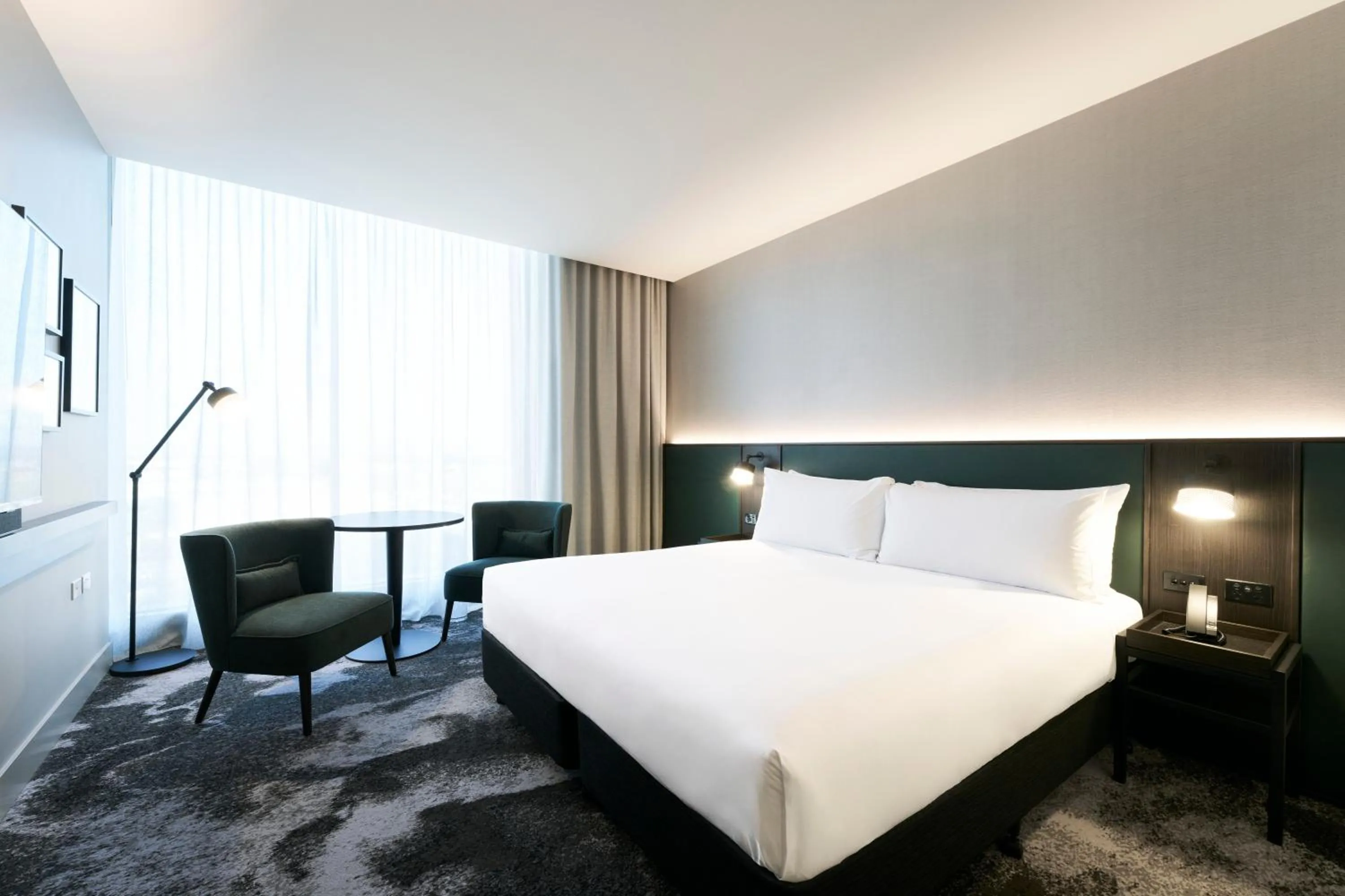 Bed in Novotel Melbourne Airport