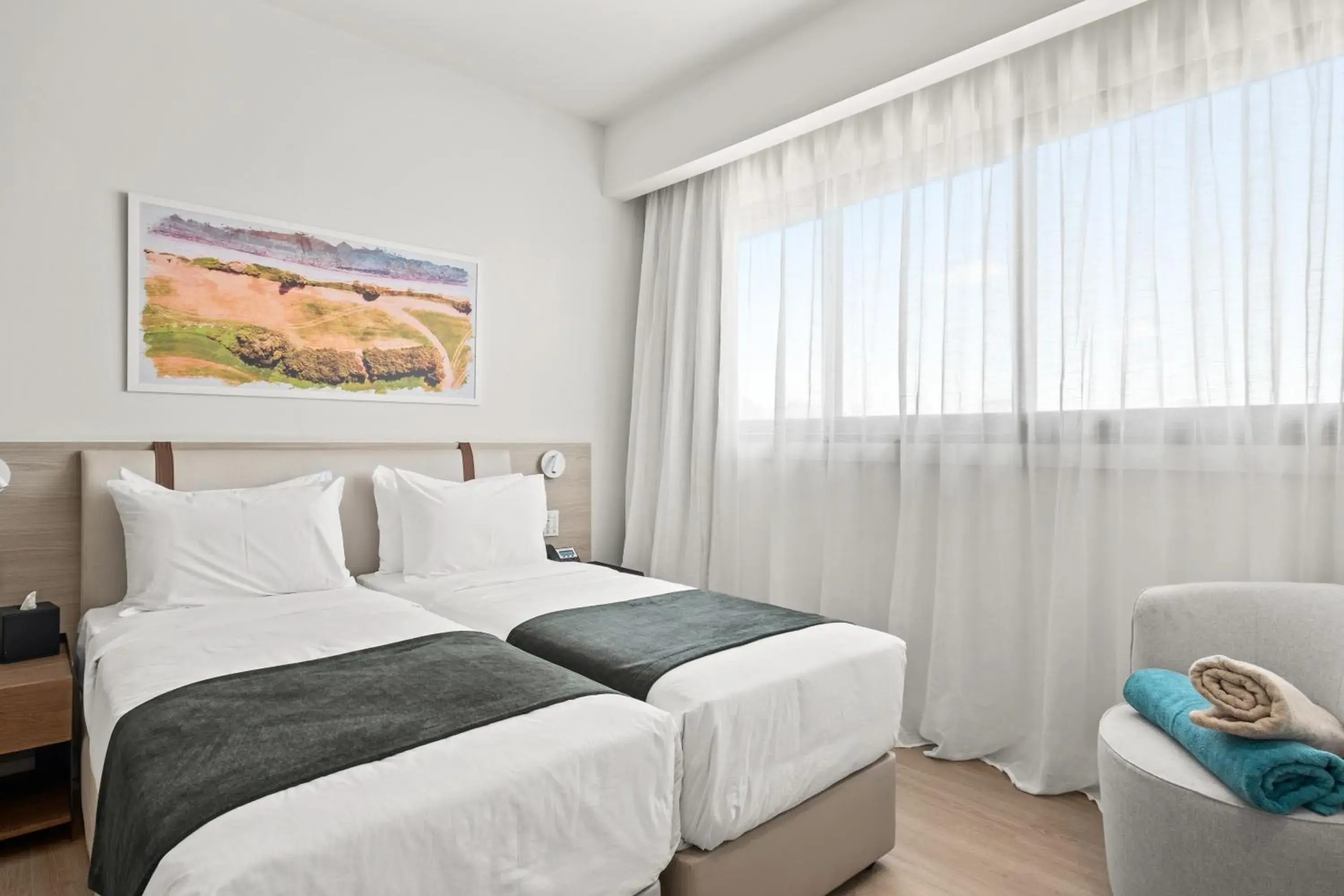 Classic room with zip beds and balcony in Mercure Larnaca Finikoudes Beach Classic room with zip beds and balcony in Mercure Larnaca Finikoudes Beach