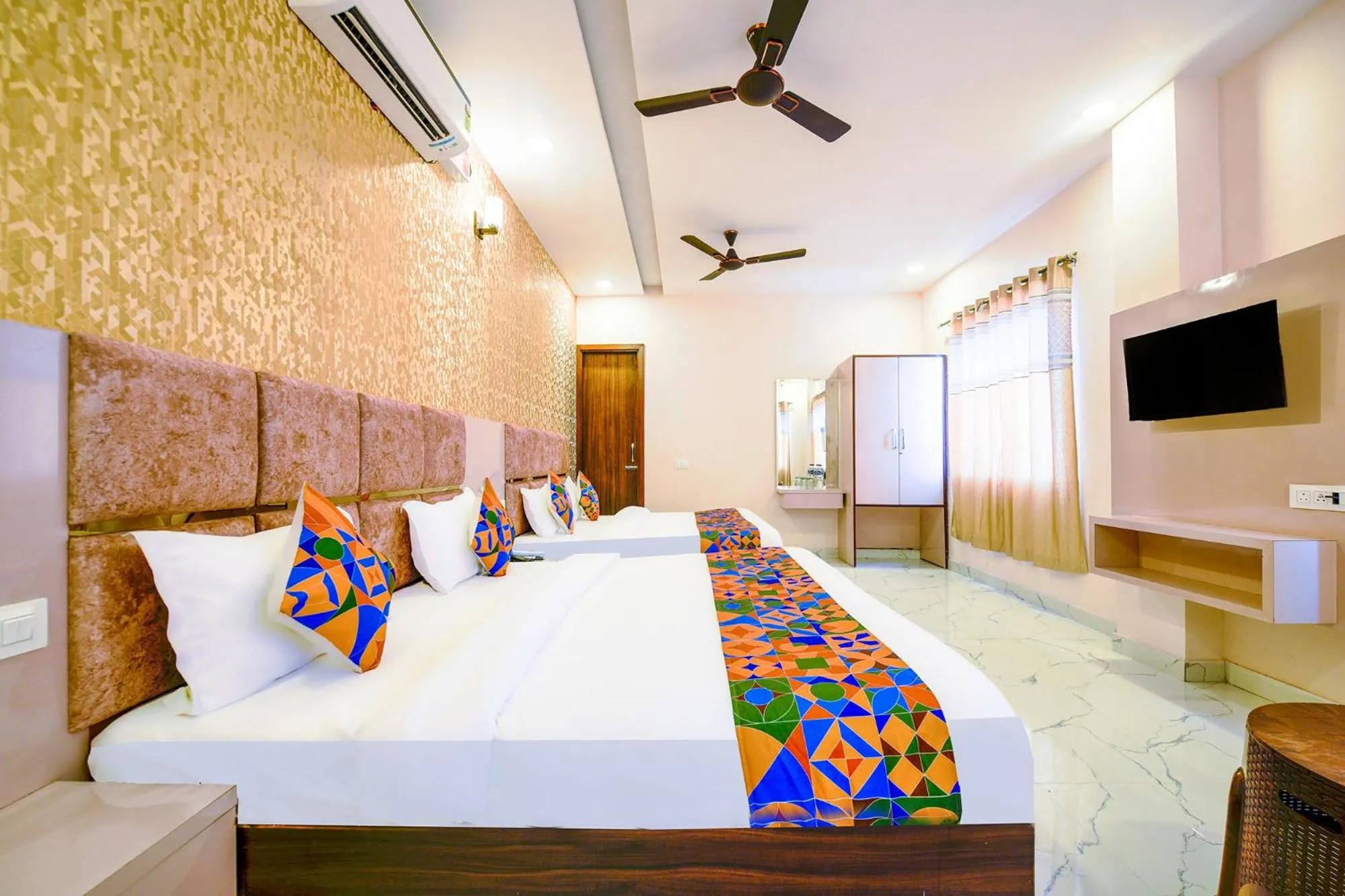 Bed in FabHotel Lohgarh Inn