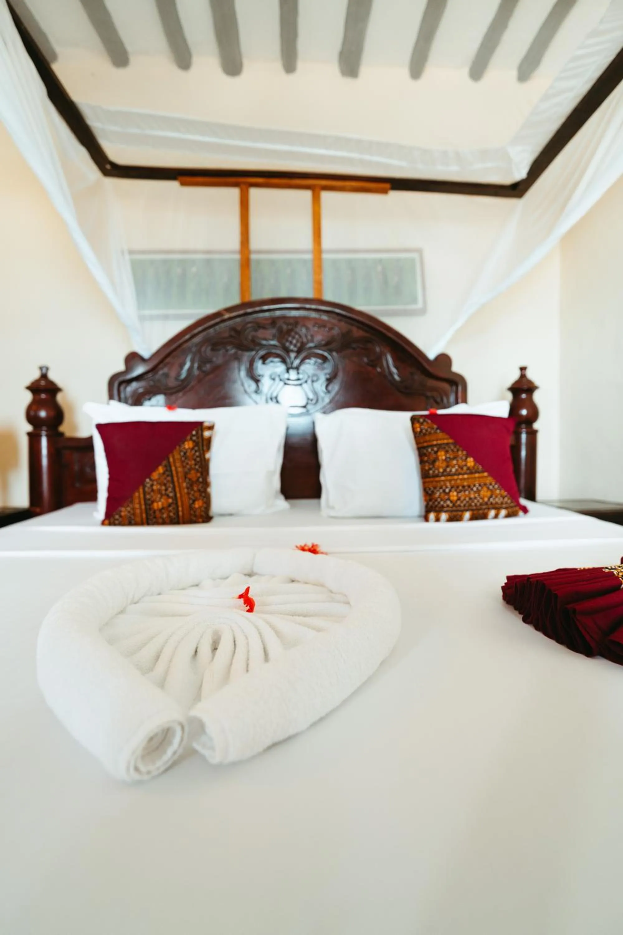 Bed in Amaan Beach Bungalows