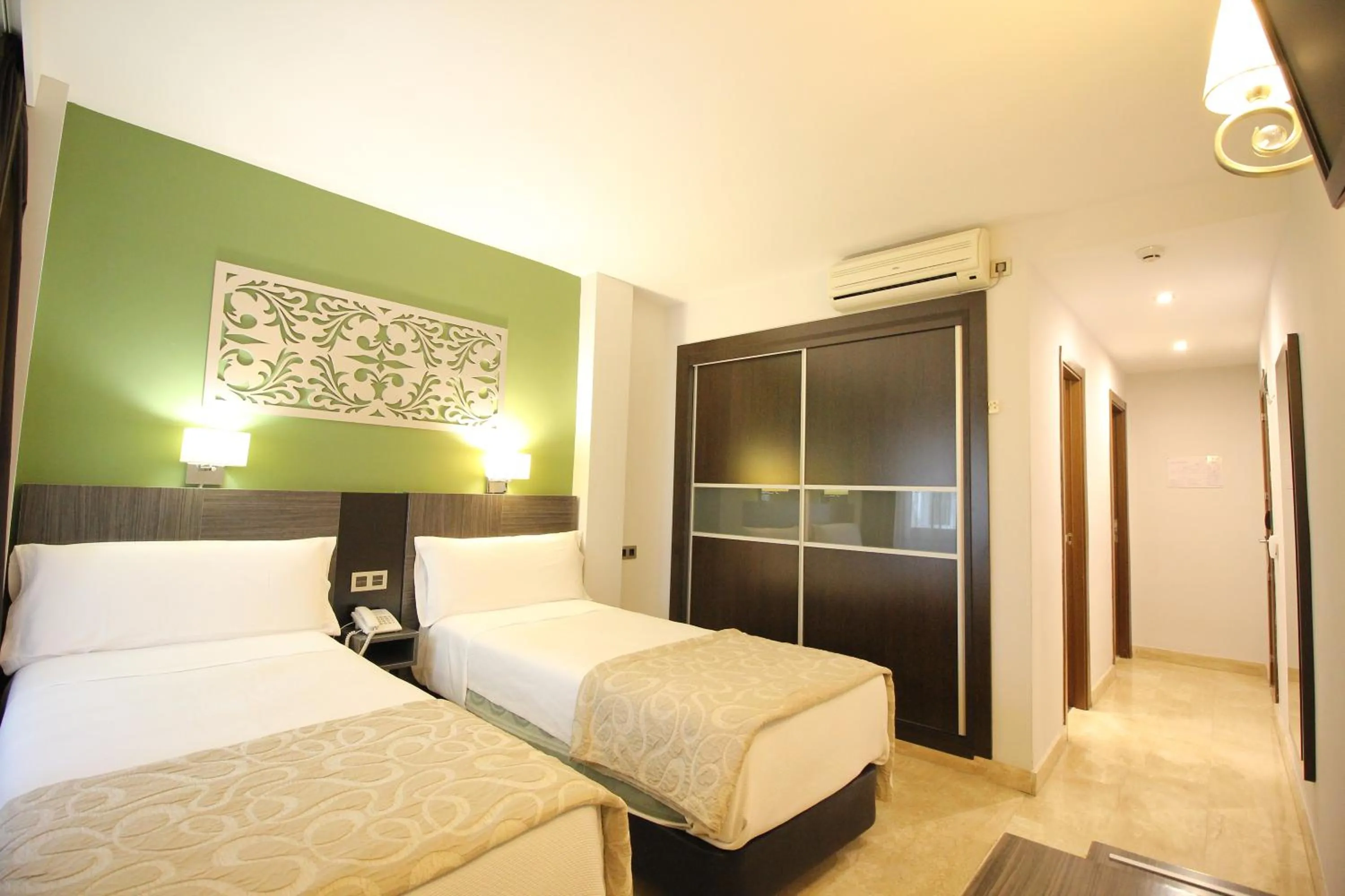 Bed in Hotel Venecia