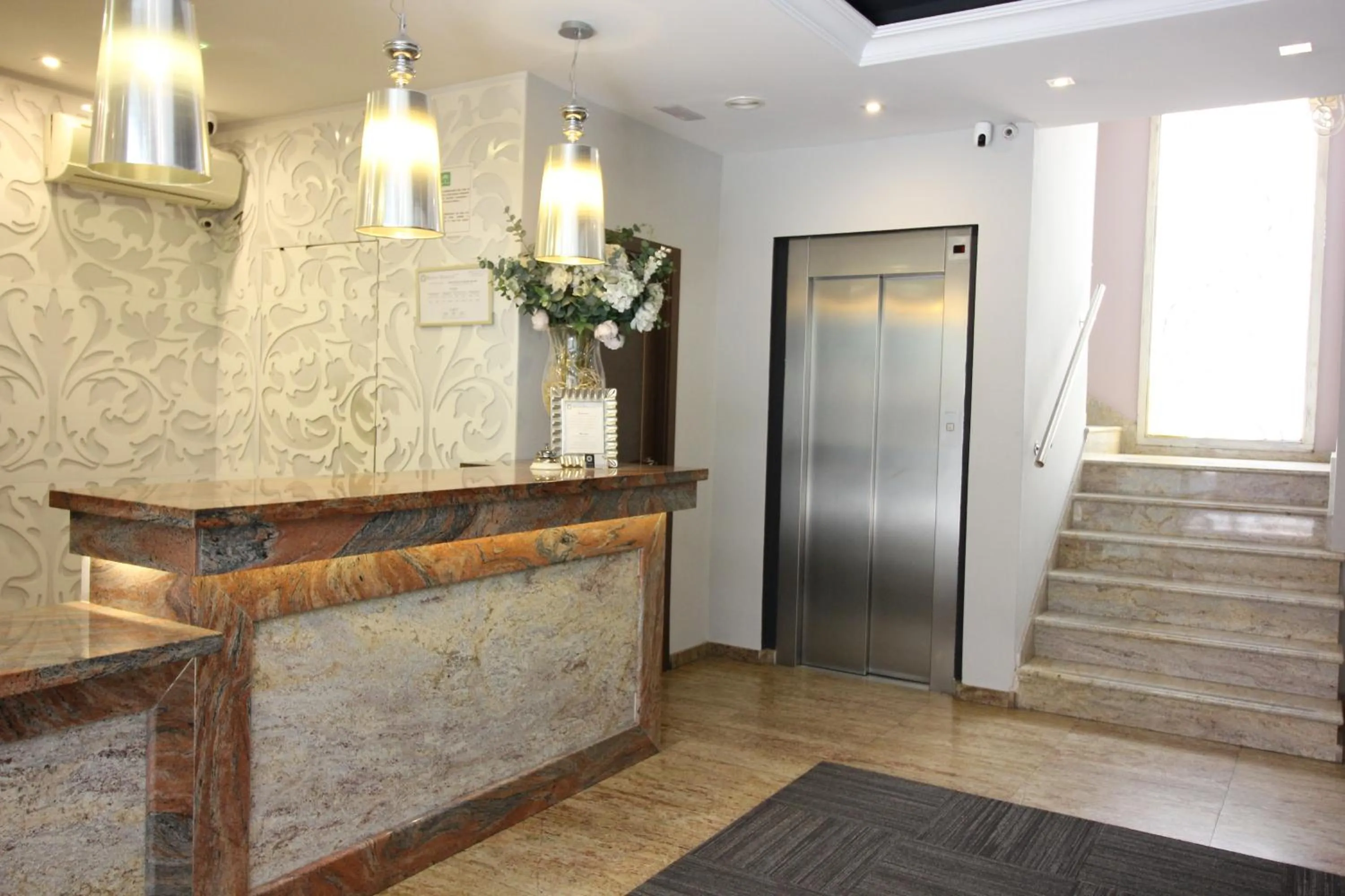 Lobby or reception in Hotel Venecia