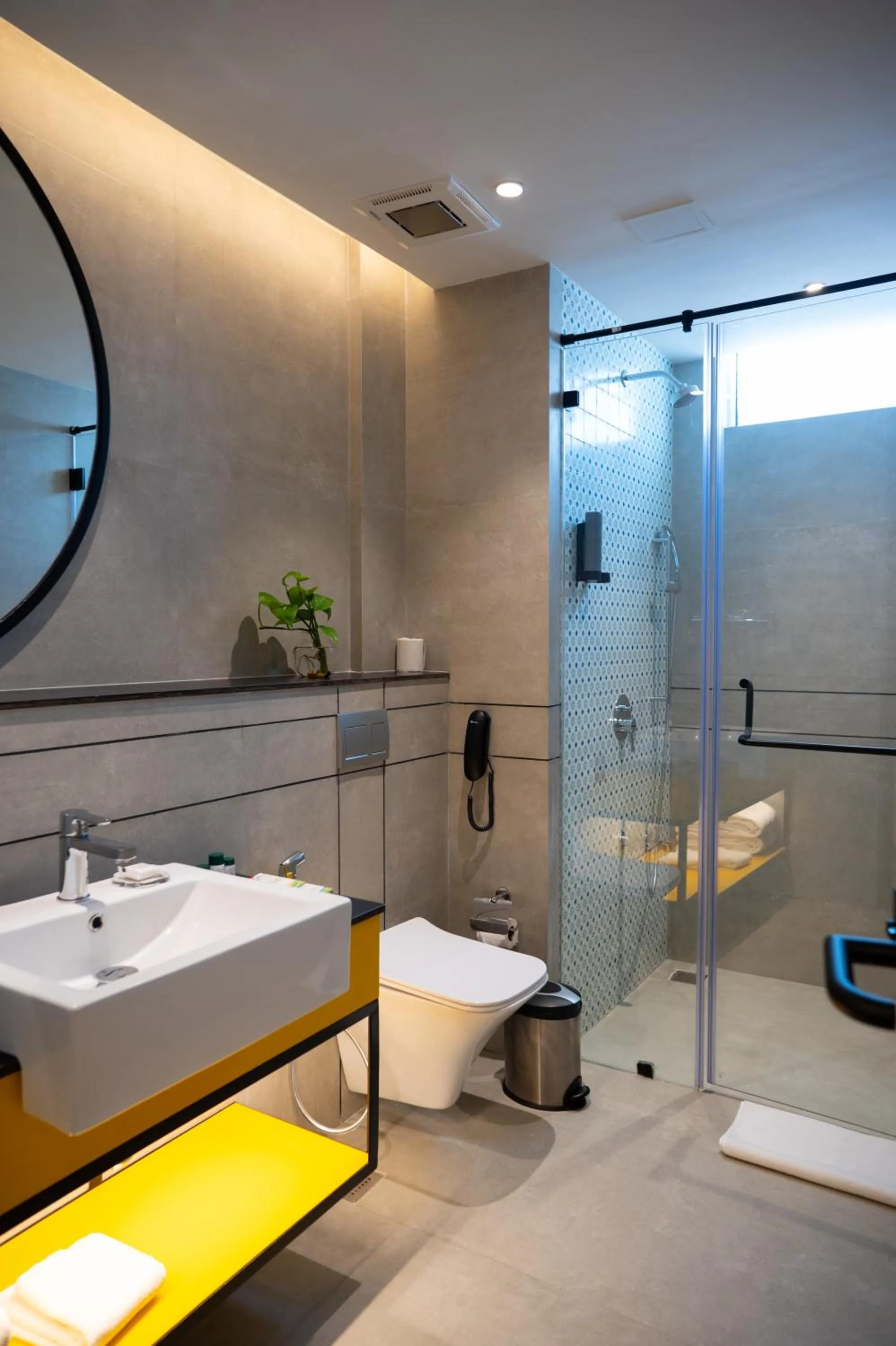 Bathroom in ZIBE Luxe Kakinada by GRT Hotels