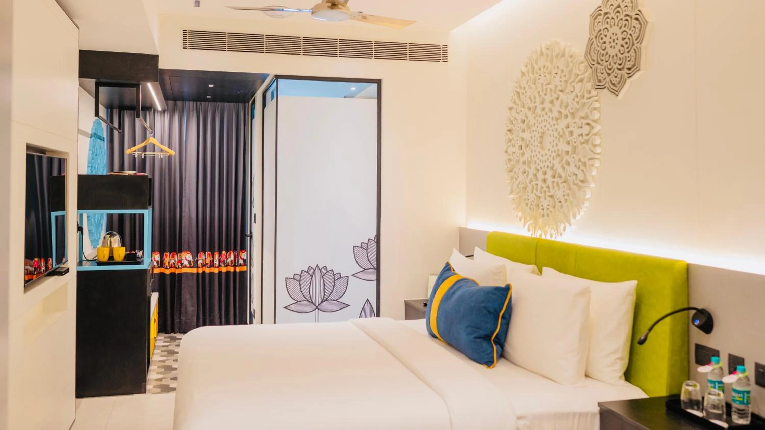 Bed in ZIBE Luxe Kakinada by GRT Hotels