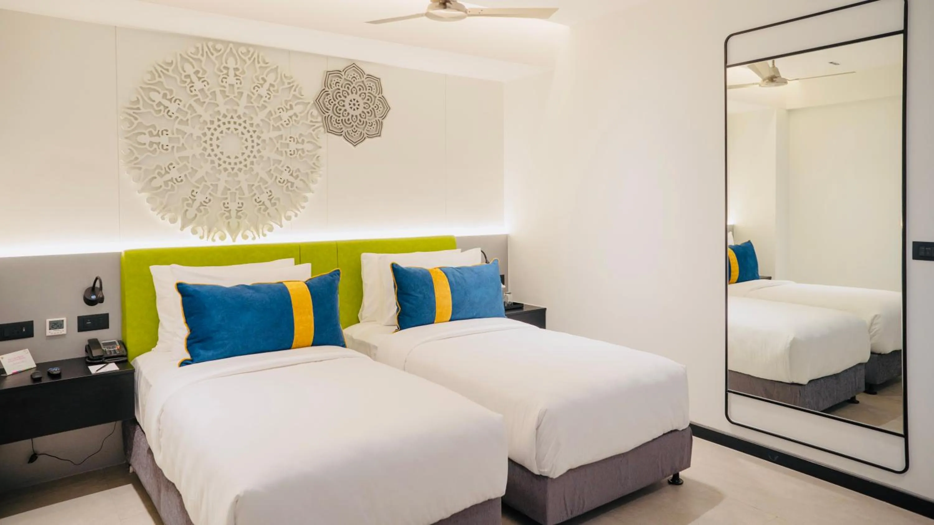 Bedroom, Bed in ZIBE Luxe Kakinada by GRT Hotels
