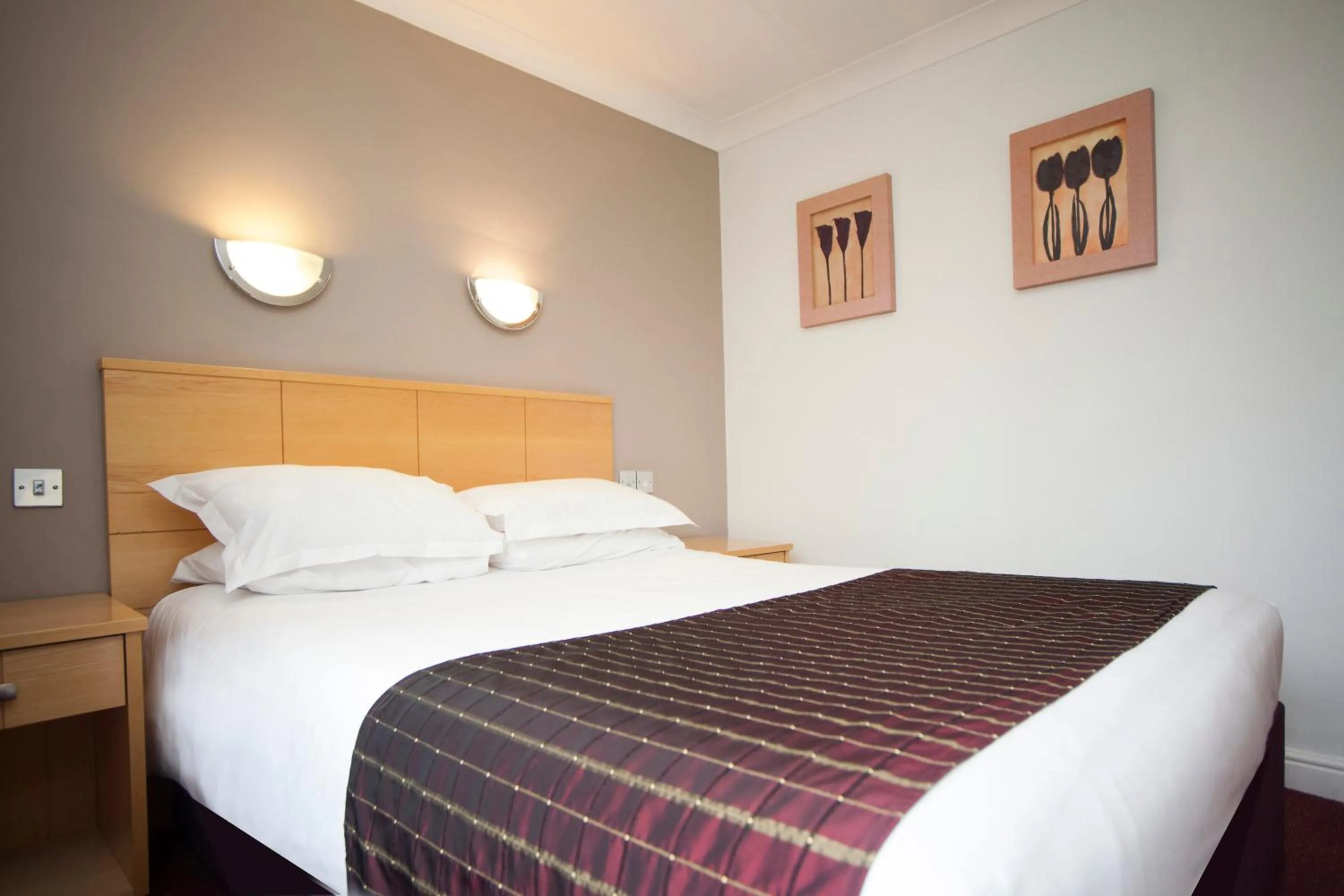 Bedroom in The Victoria Hotel Manchester by Compass Hospitality