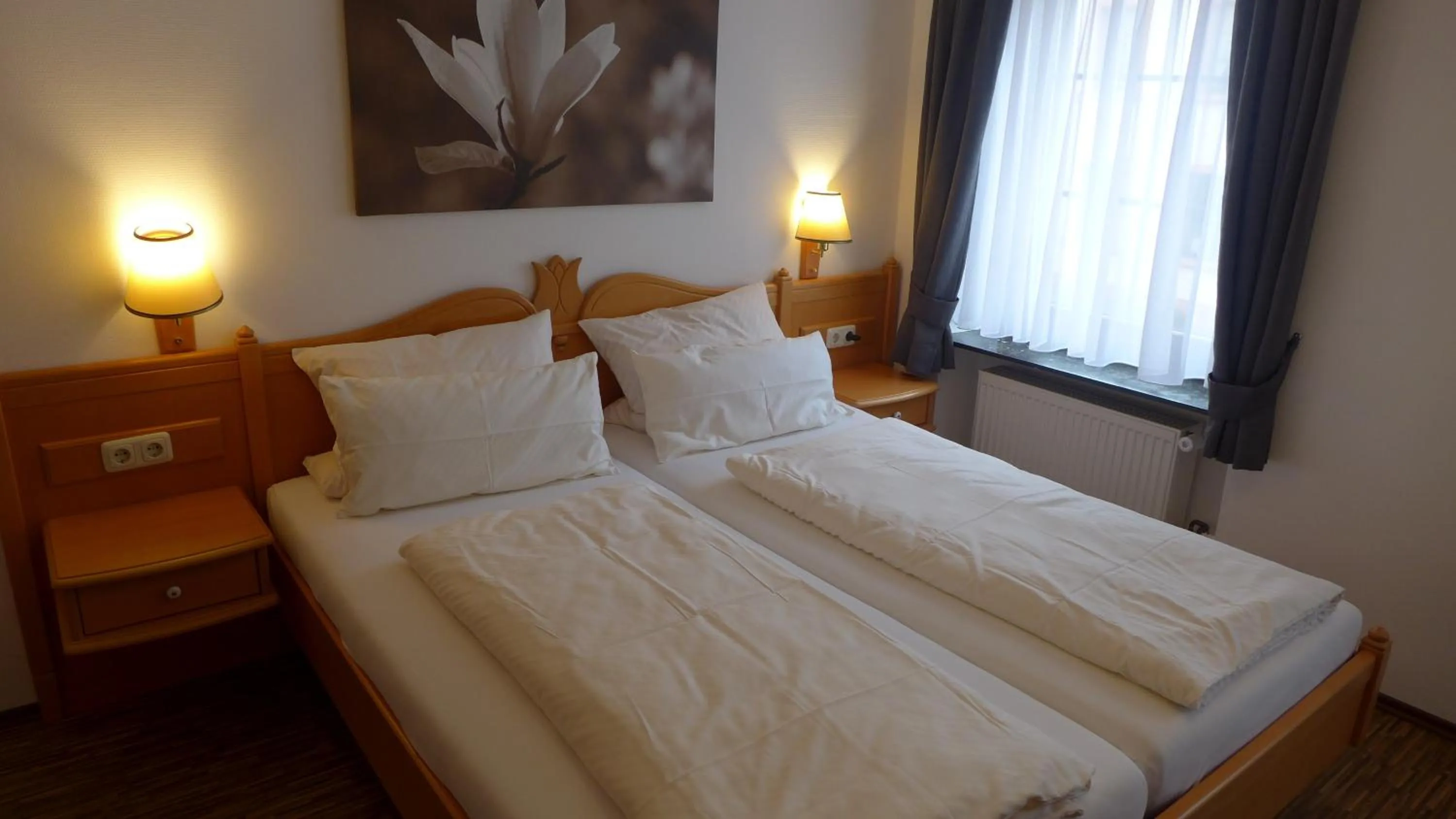 Bed in Central-Hotel Greiveldinger