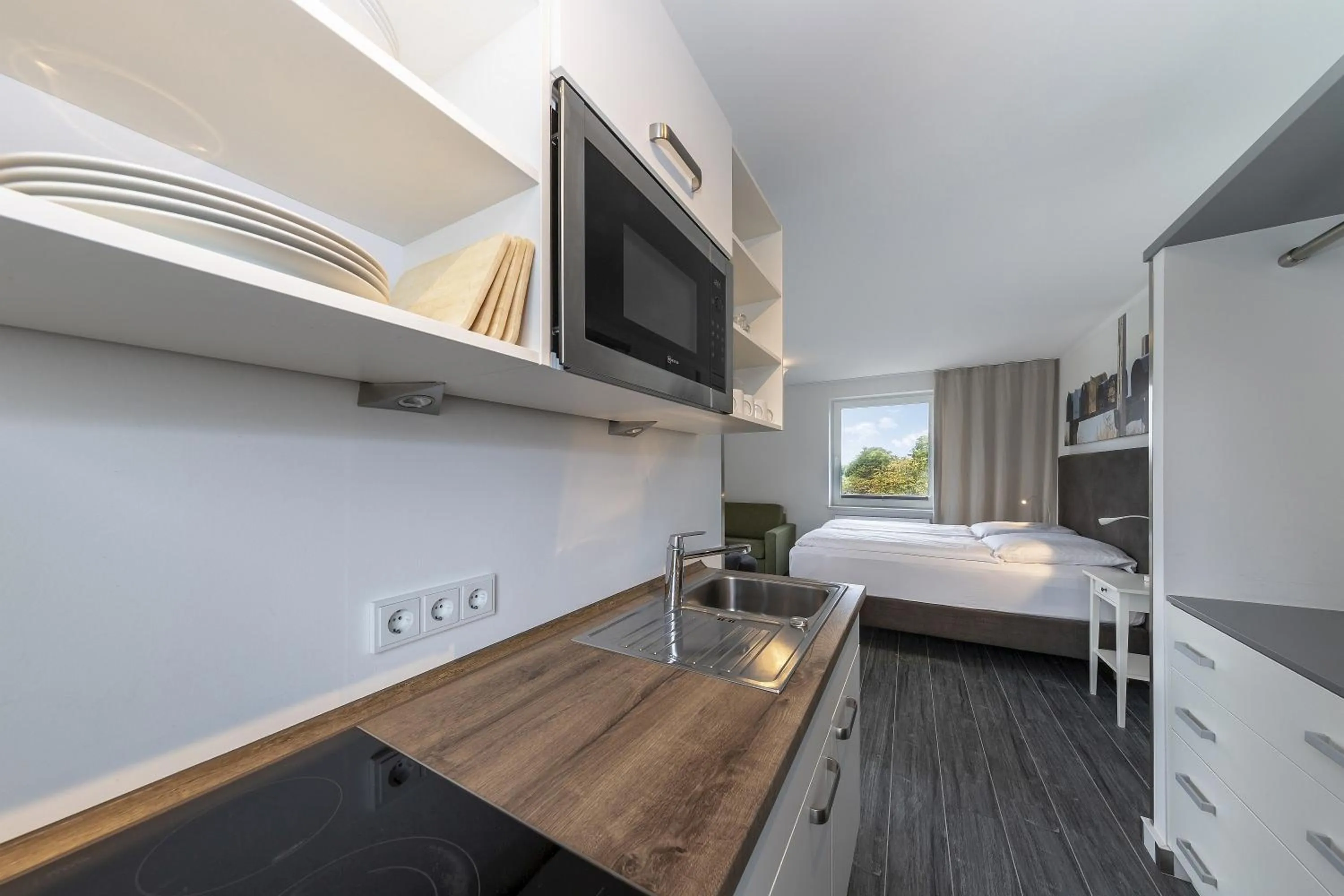 Kitchen or kitchenette, Bed in Beach Hotel California