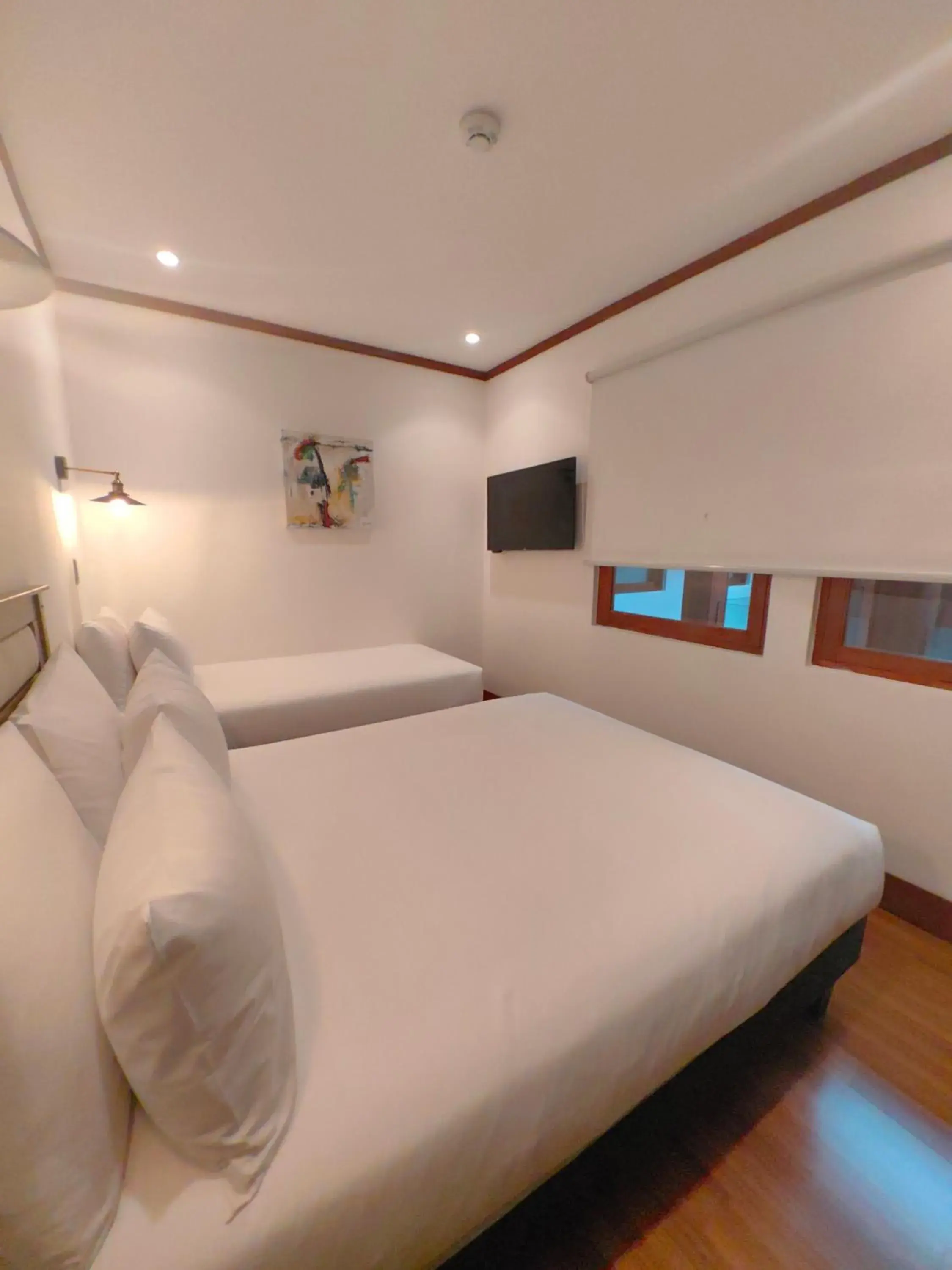 Standard Triple Room in Concha y Toro 33 Hotel Boutique by Nobile Standard Triple Room in Concha y Toro 33 Hotel Boutique by Nobile