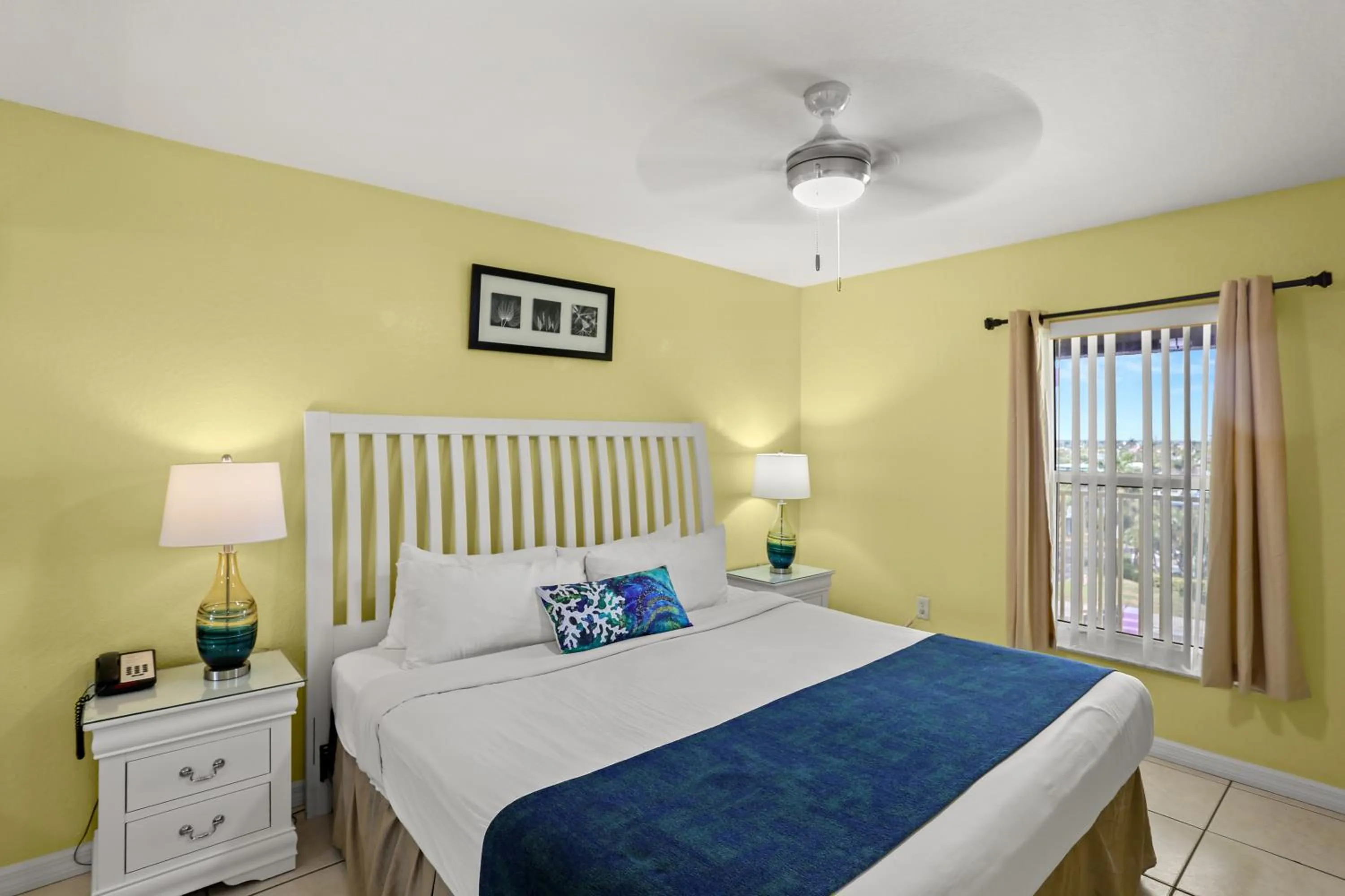 Bed in South Beach Condo Hotel by Travel Resort Services, Inc.