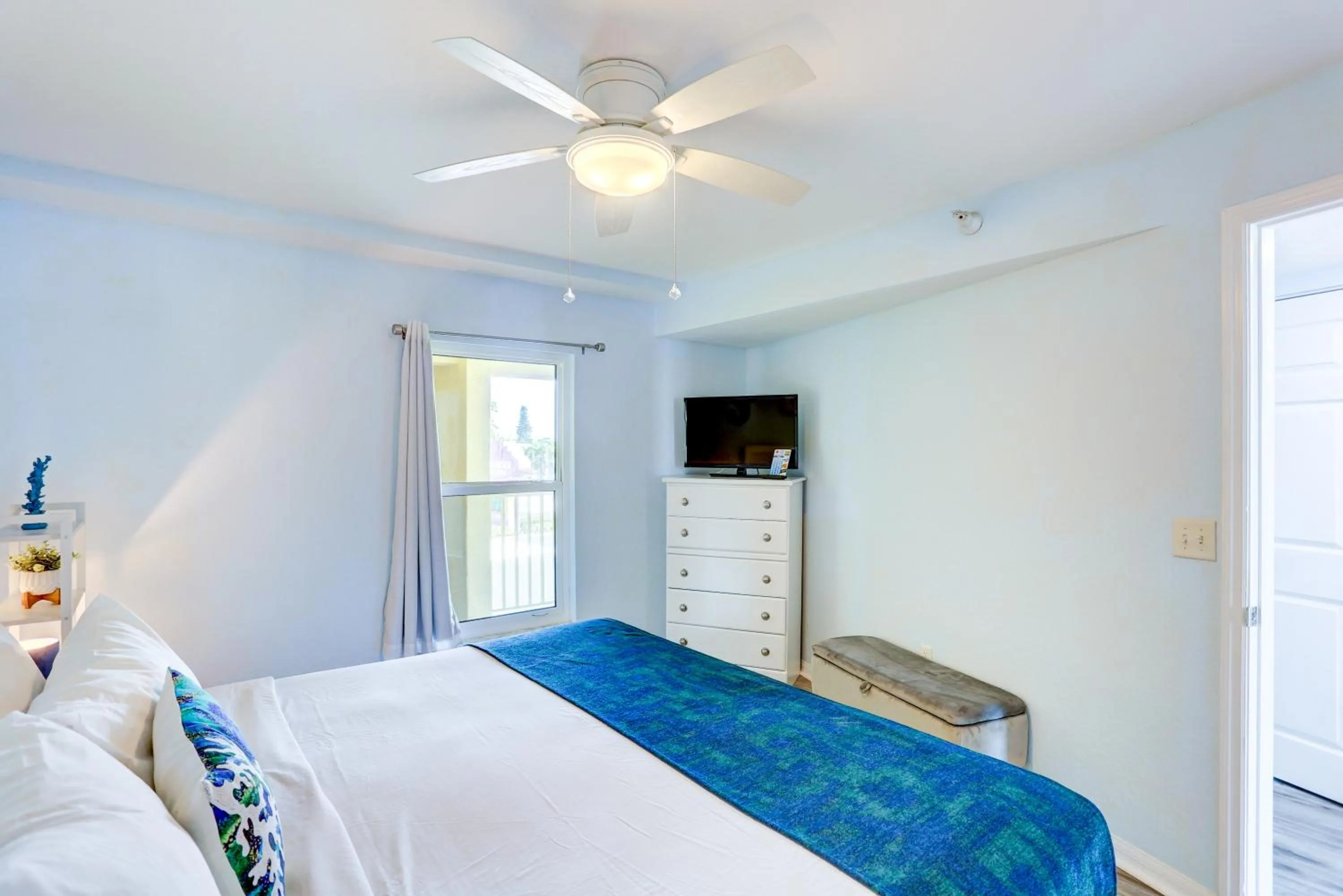 Bed in South Beach Condo Hotel by Travel Resort Services, Inc.