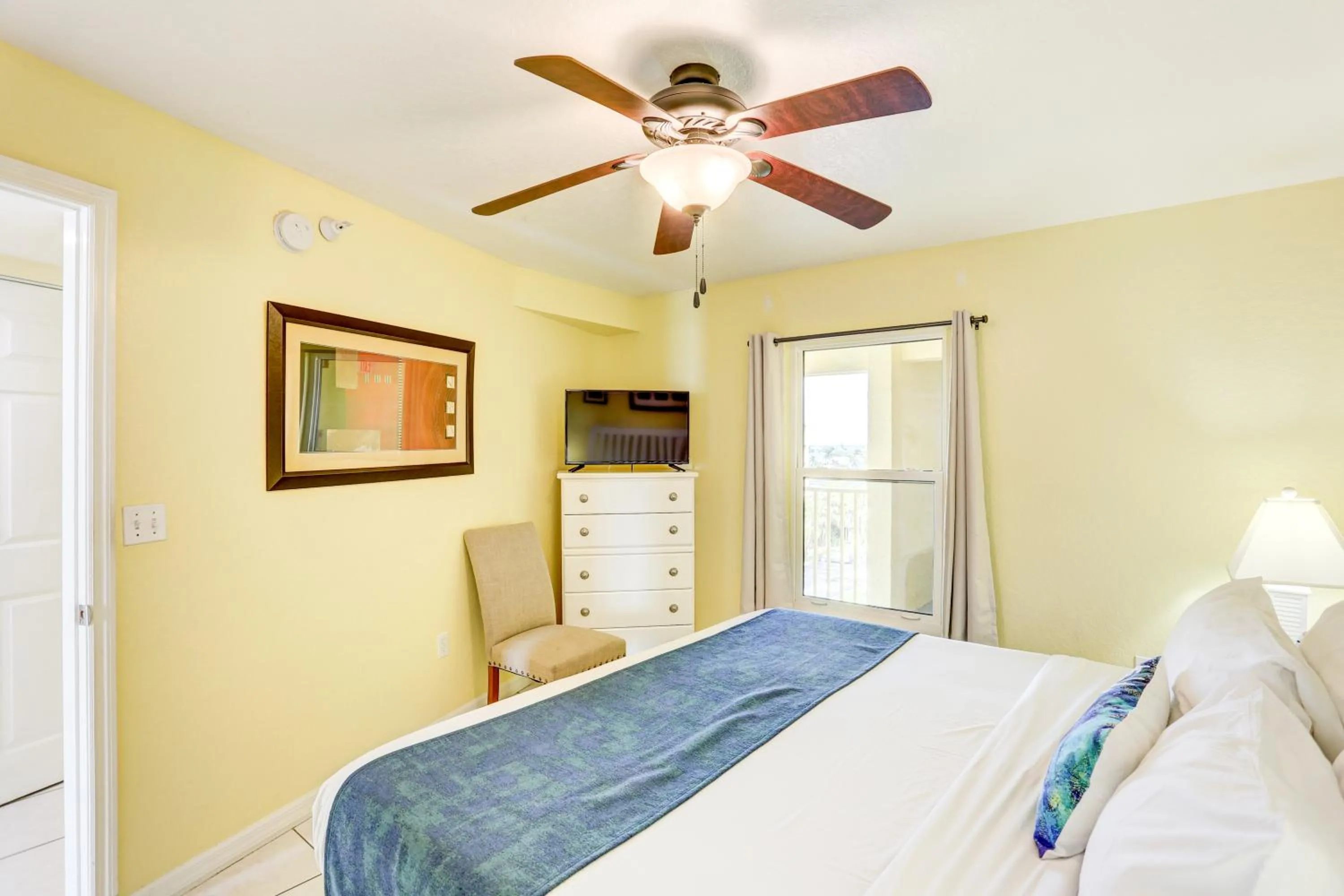 Bed in South Beach Condo Hotel by Travel Resort Services, Inc.