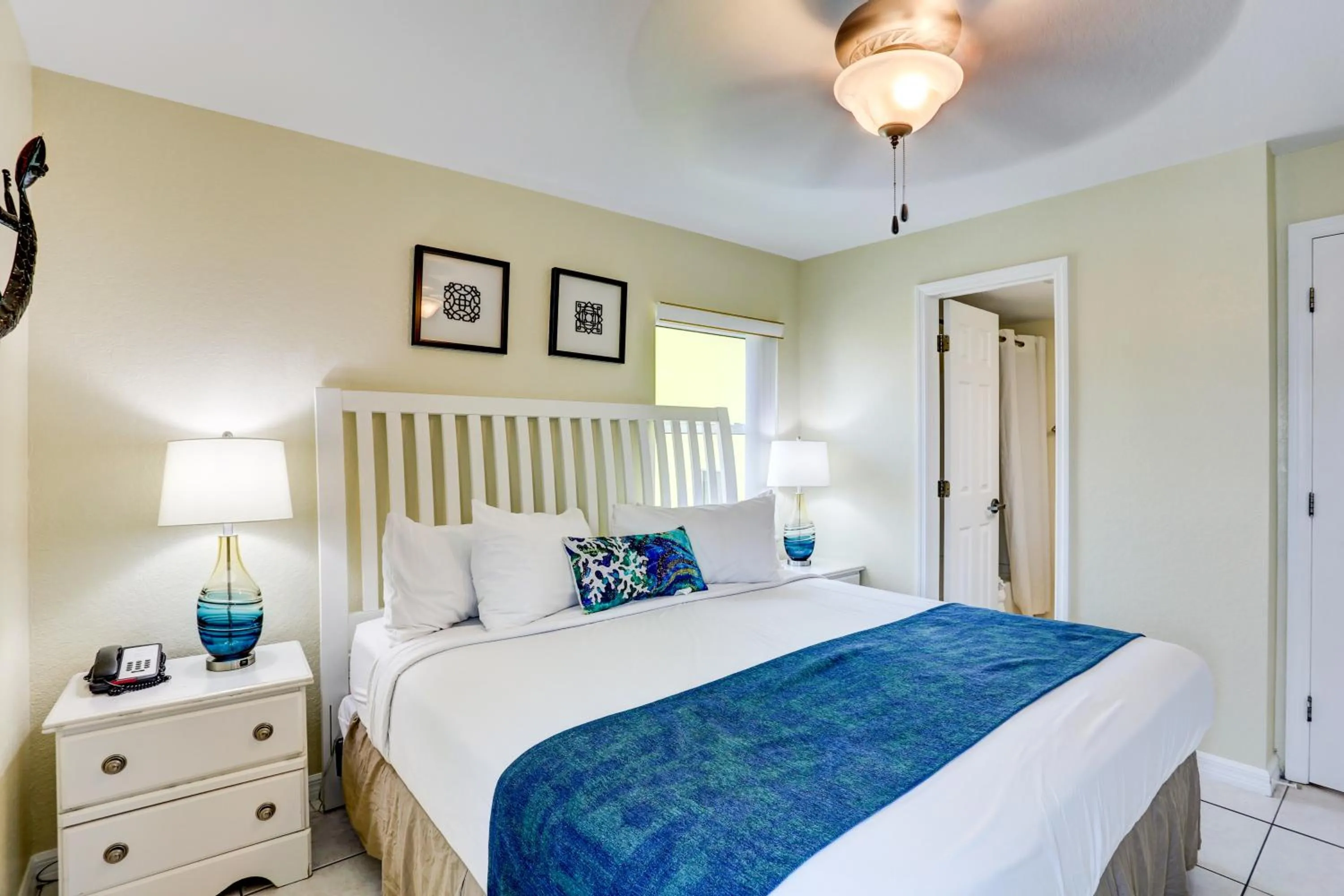 Bed in South Beach Condo Hotel by Travel Resort Services, Inc.