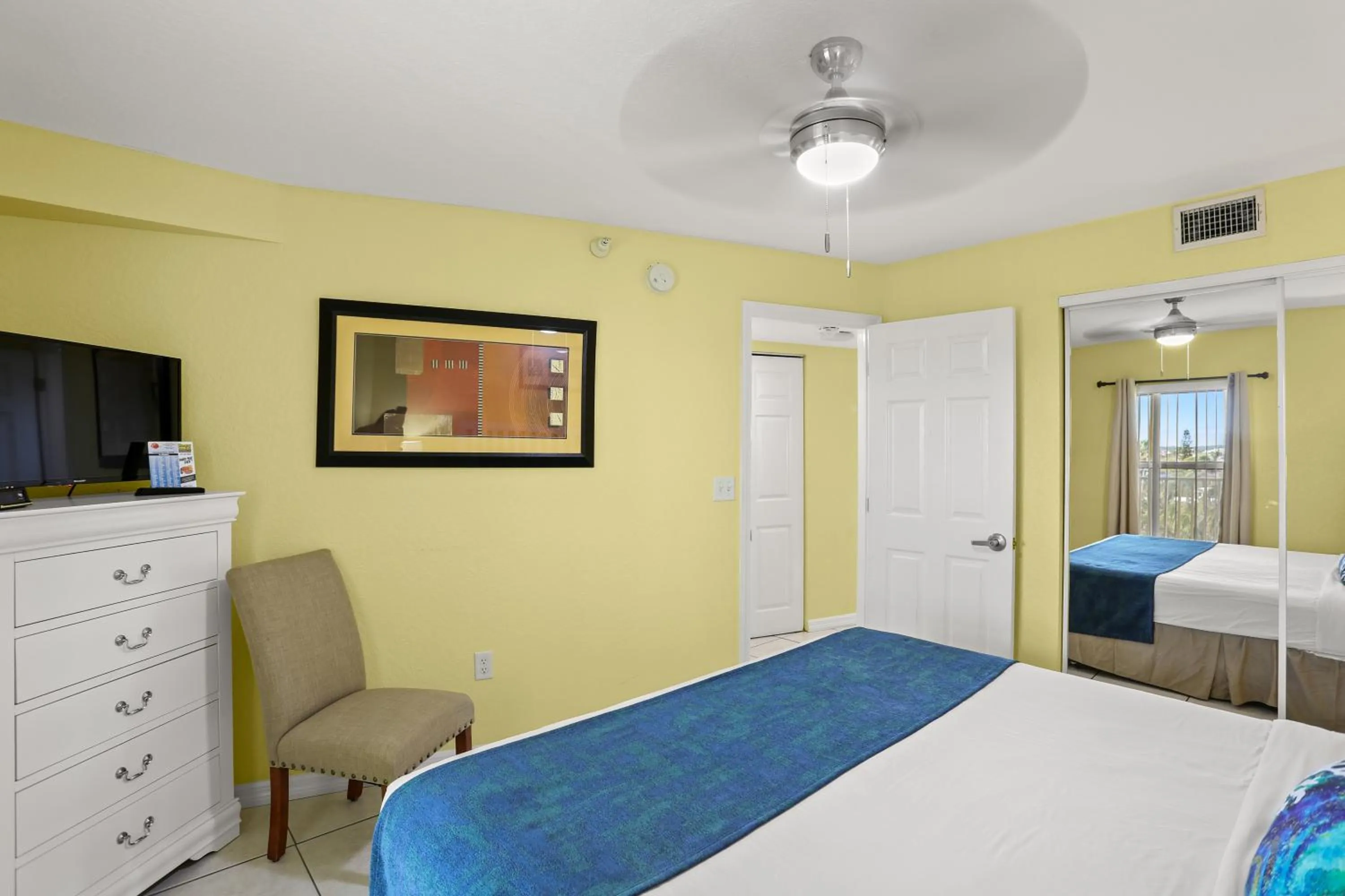 Bed in South Beach Condo Hotel by Travel Resort Services, Inc.