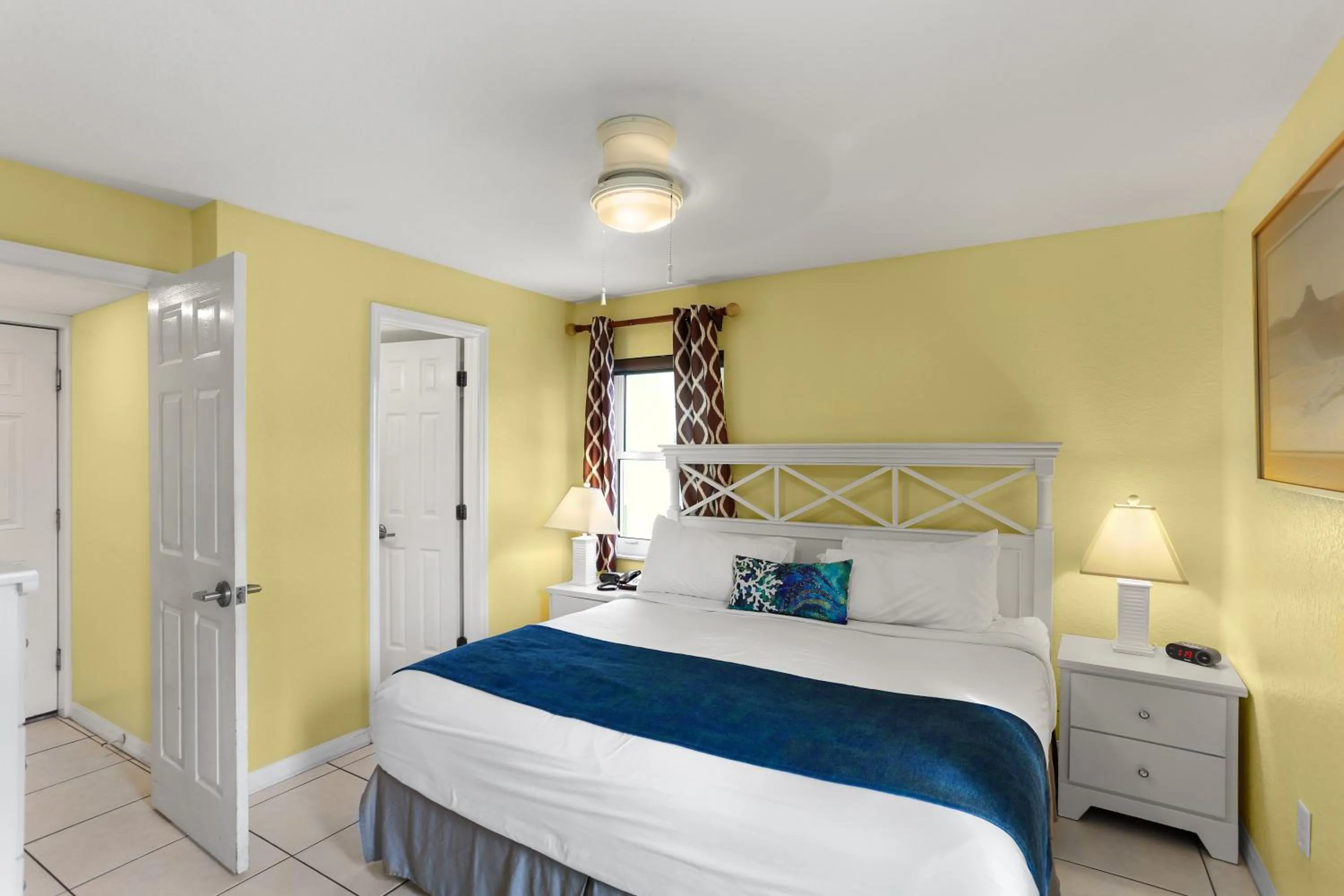 Bed in South Beach Condo Hotel by Travel Resort Services, Inc.