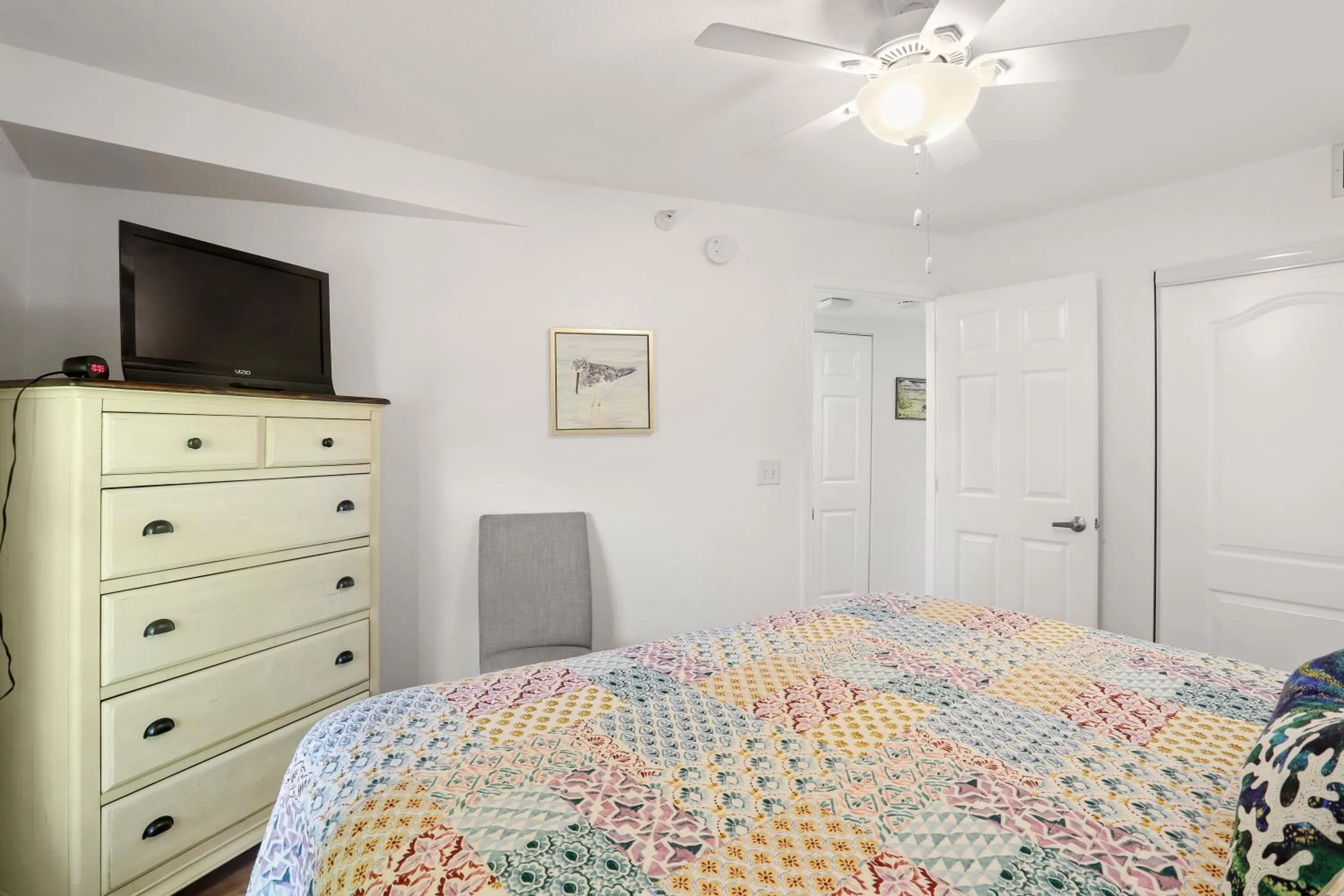 Bed in South Beach Condo Hotel by Travel Resort Services, Inc.