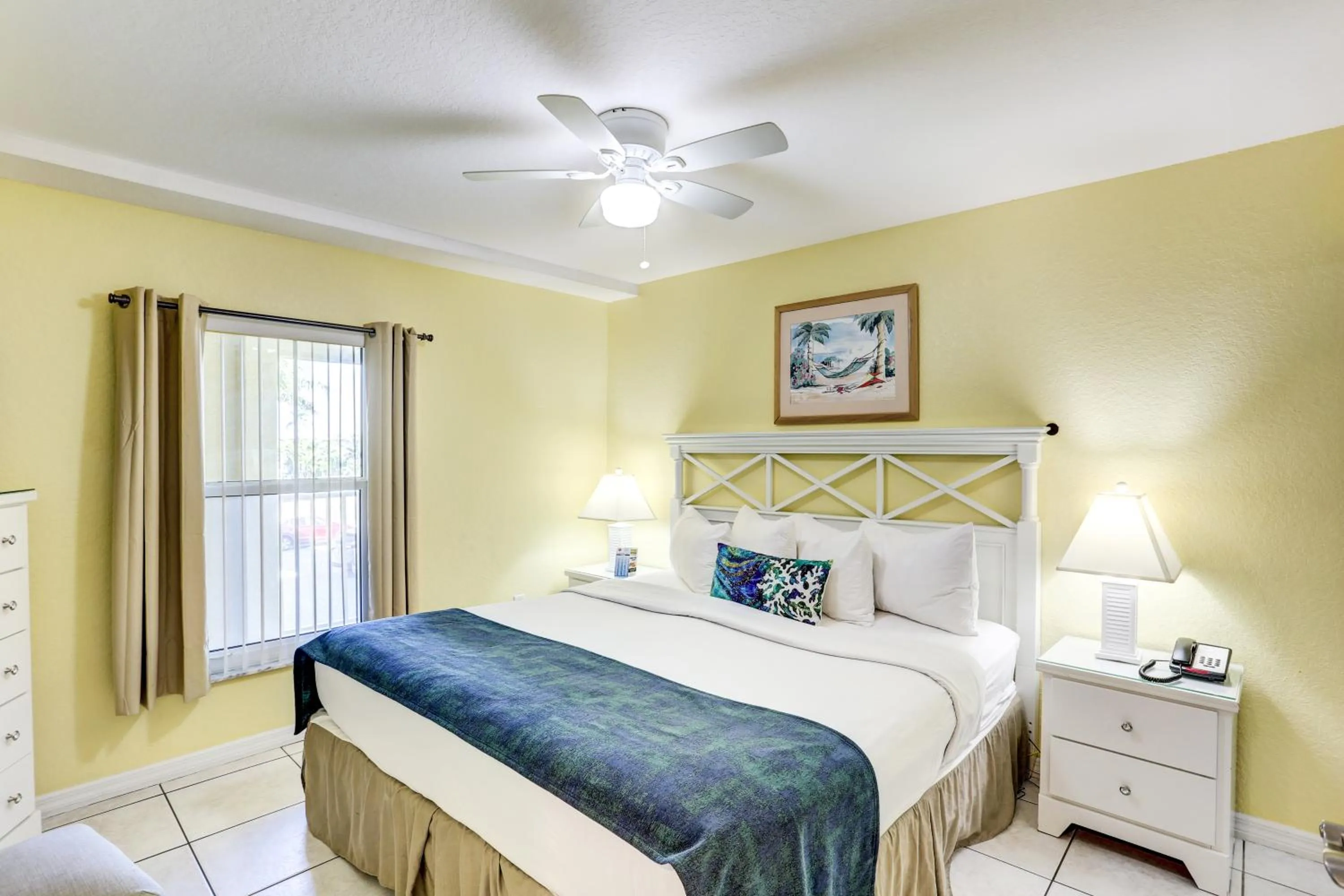 Bed in South Beach Condo Hotel by Travel Resort Services, Inc.