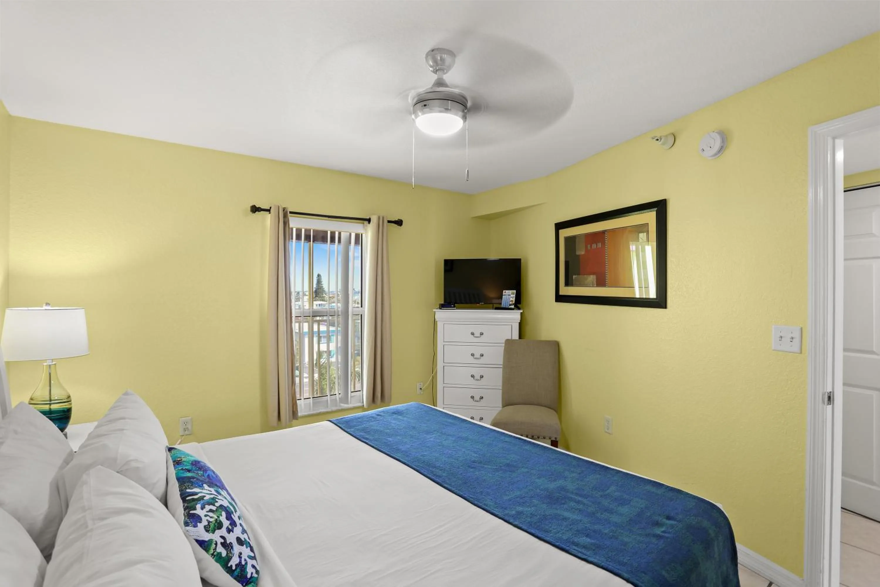 Bed in South Beach Condo Hotel by Travel Resort Services, Inc.