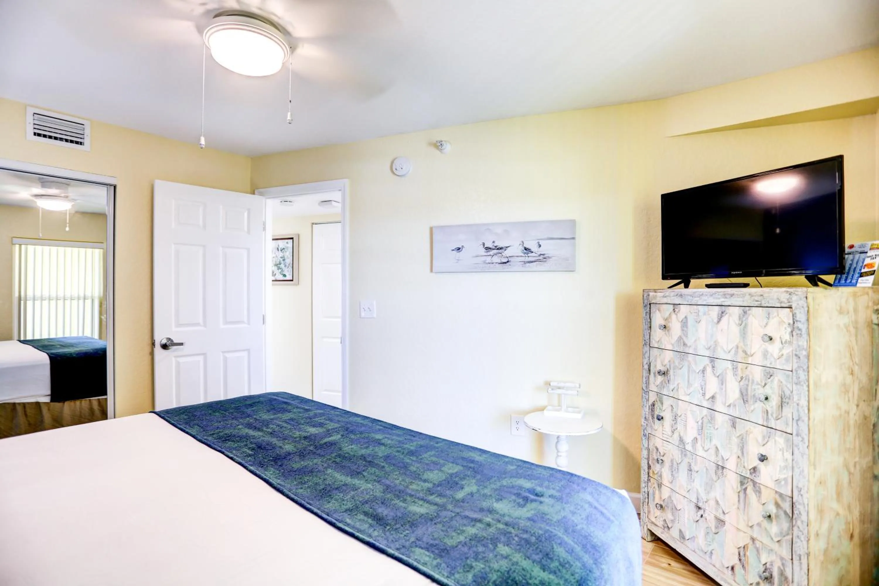 Bed in South Beach Condo Hotel by Travel Resort Services, Inc.