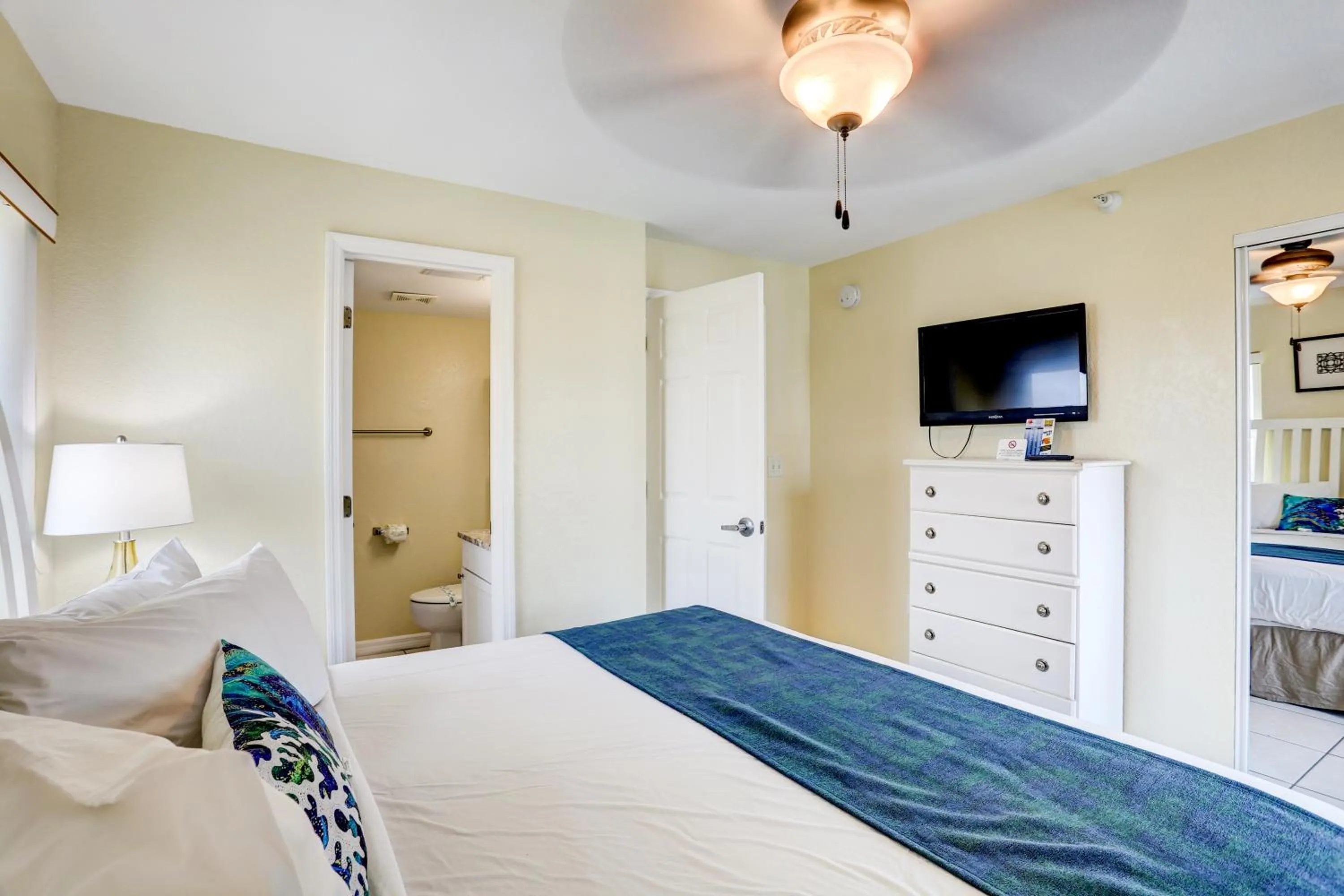 Bed in South Beach Condo Hotel by Travel Resort Services, Inc.