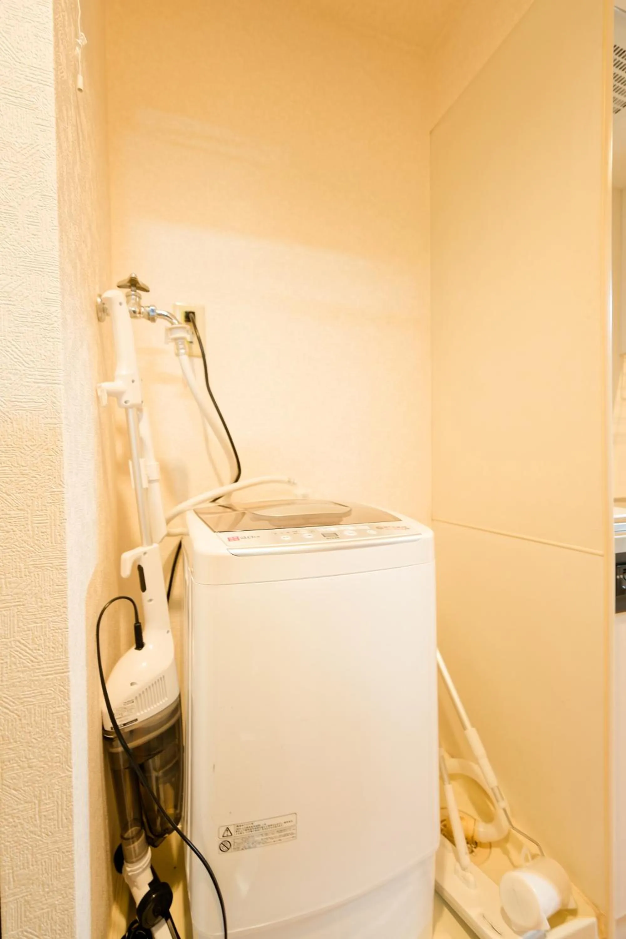 washing machine in Shinjuku Waseda Earthtone Apartment