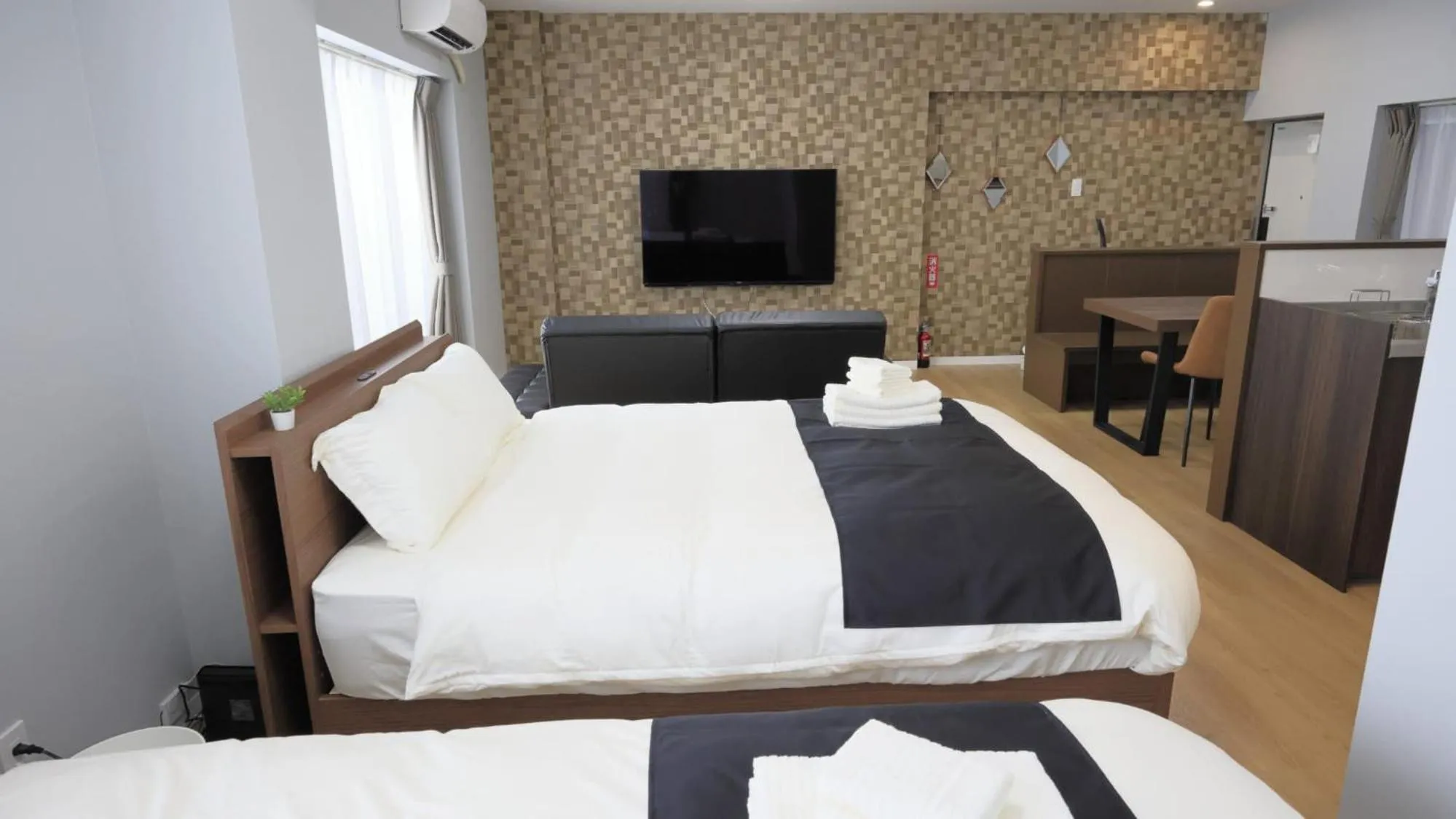 Bed in Crice Hotel Ishigakijima