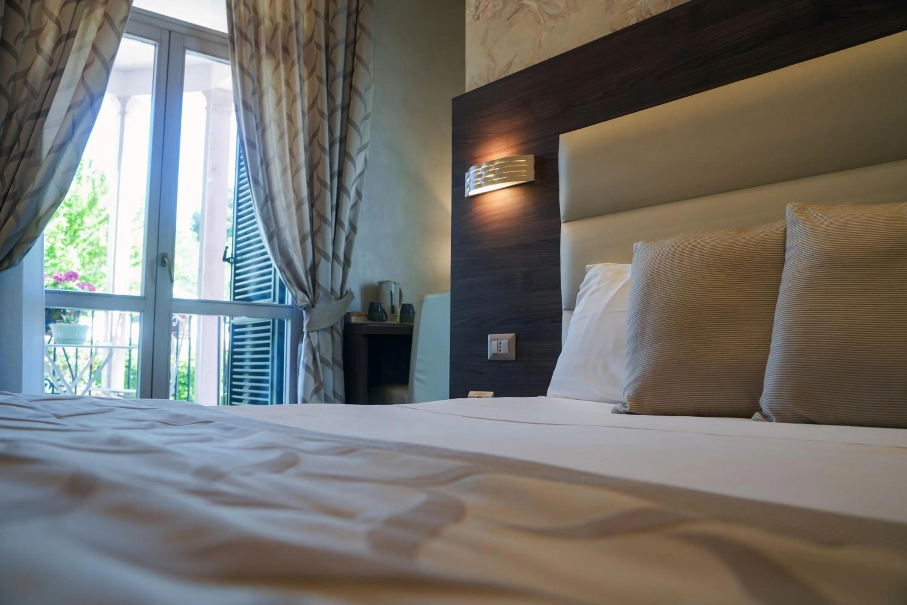 Bed in Villa Pallotta Luxury B&B